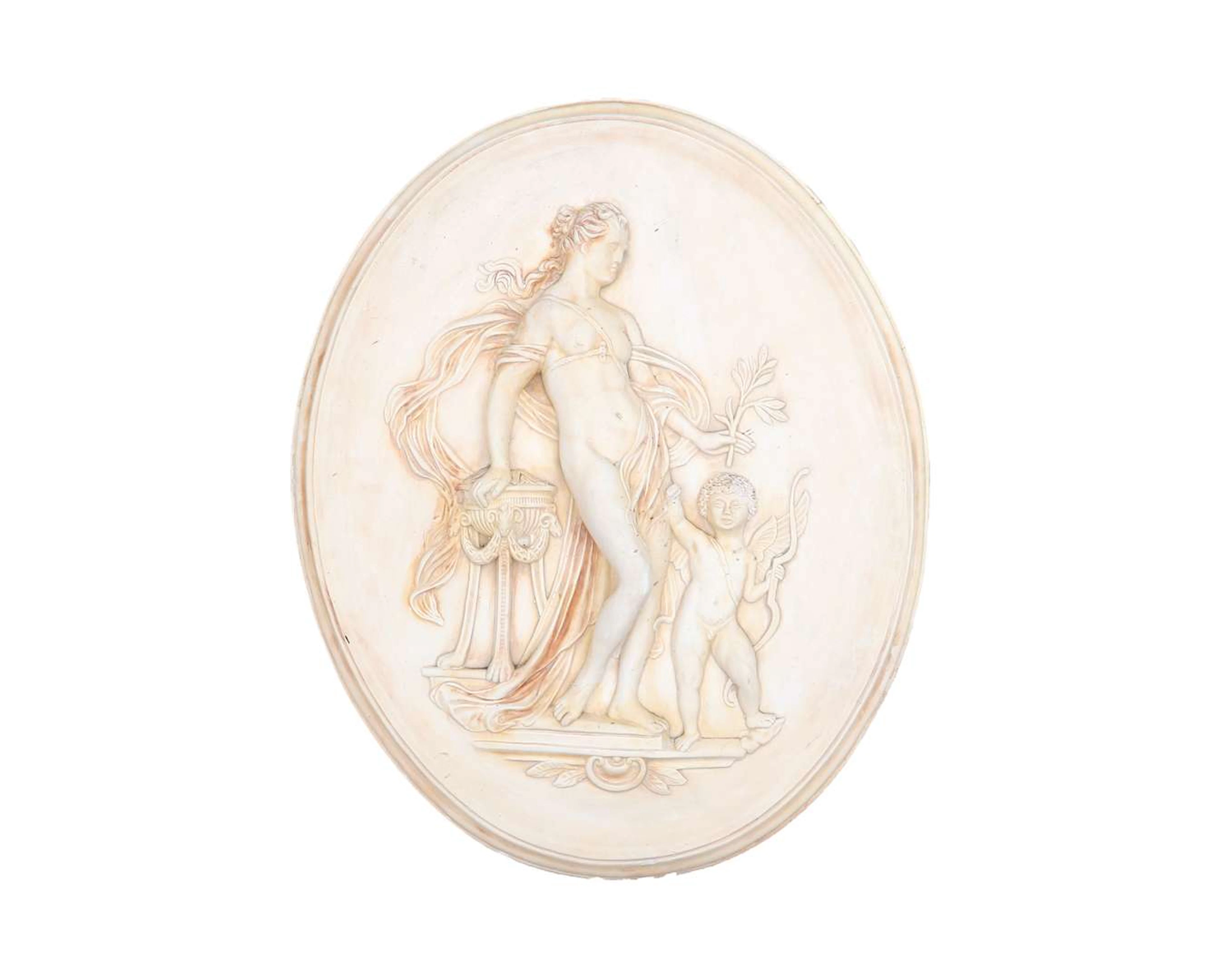 A plaster relief plaque, 20th century