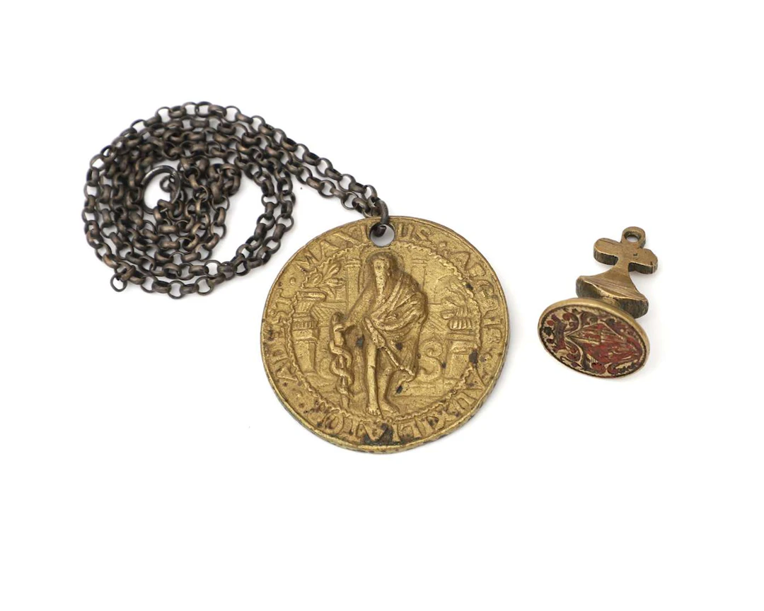 A copper key to the Hortus Medicus in Amsterdam and a copper seal