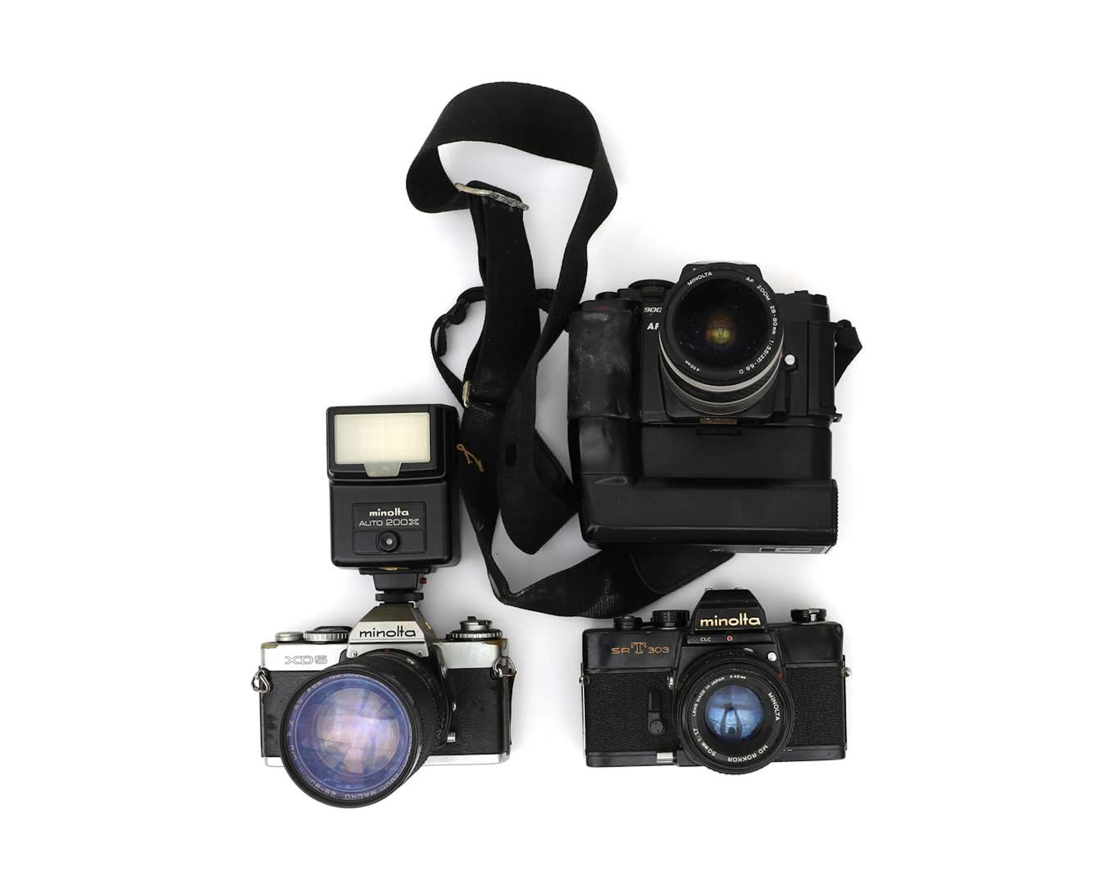 Three Minolta 35mm cameras: Minolta AF 9000, Minolta XD5 and Minolta SR-T 303