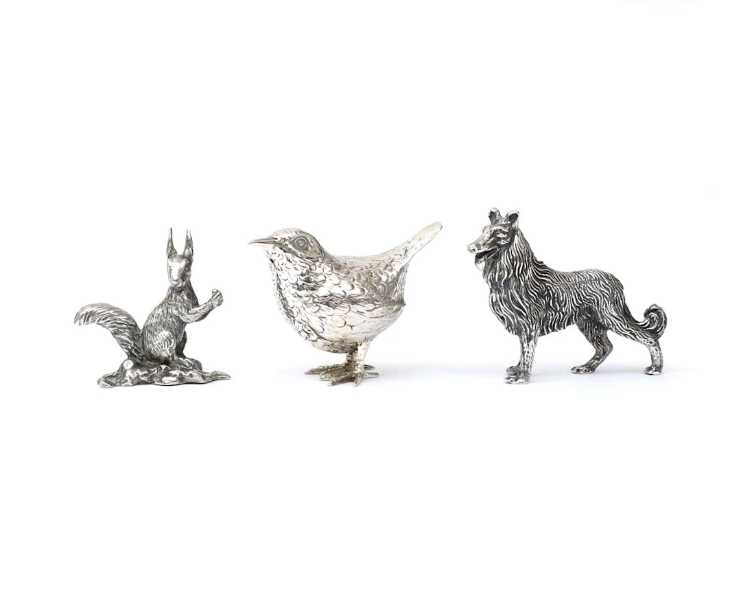 Three silver animals, 20th century