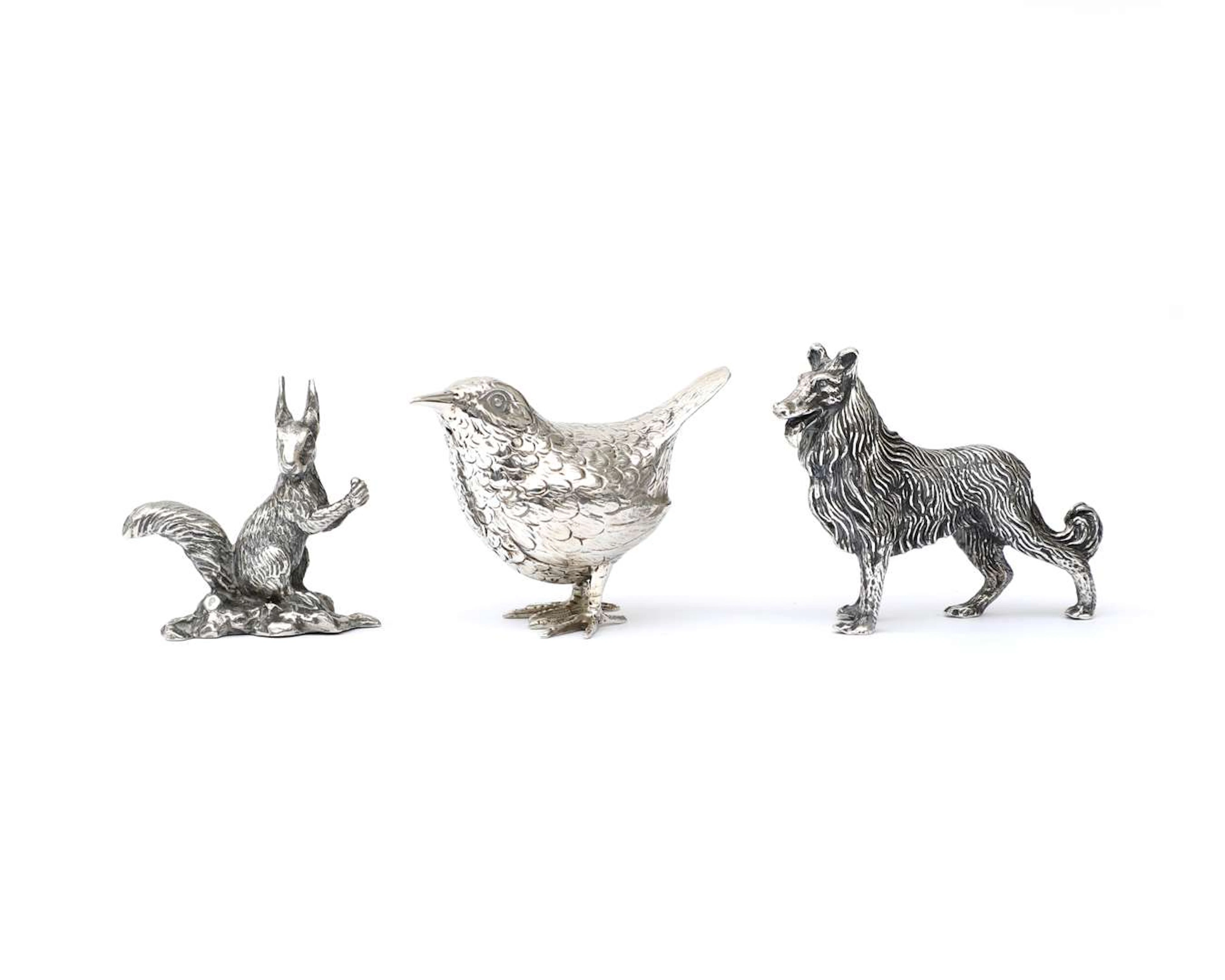 Three silver animals, 20th century