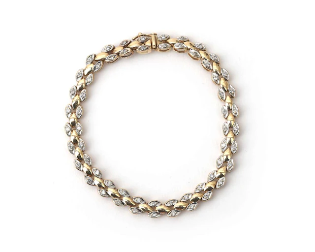 A 14k two-tone gold link bracelet with a diamond