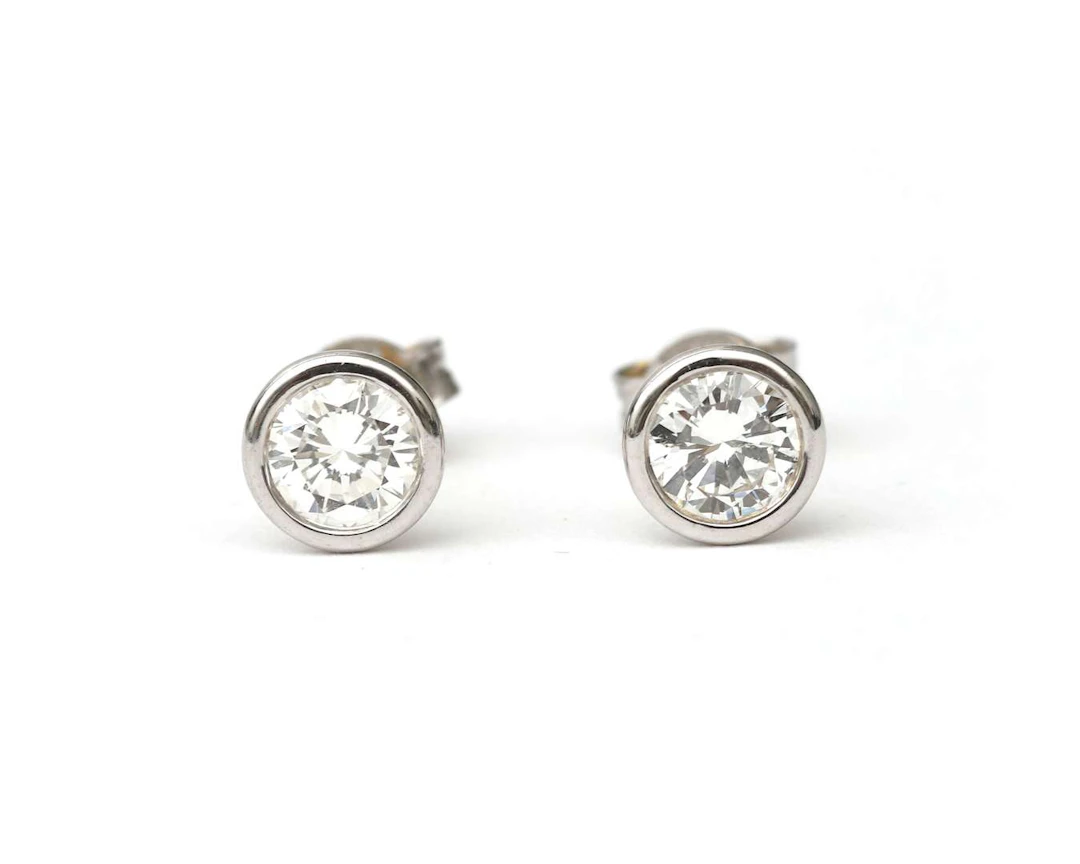 A pair of 18k white gold ear studs with diamonds