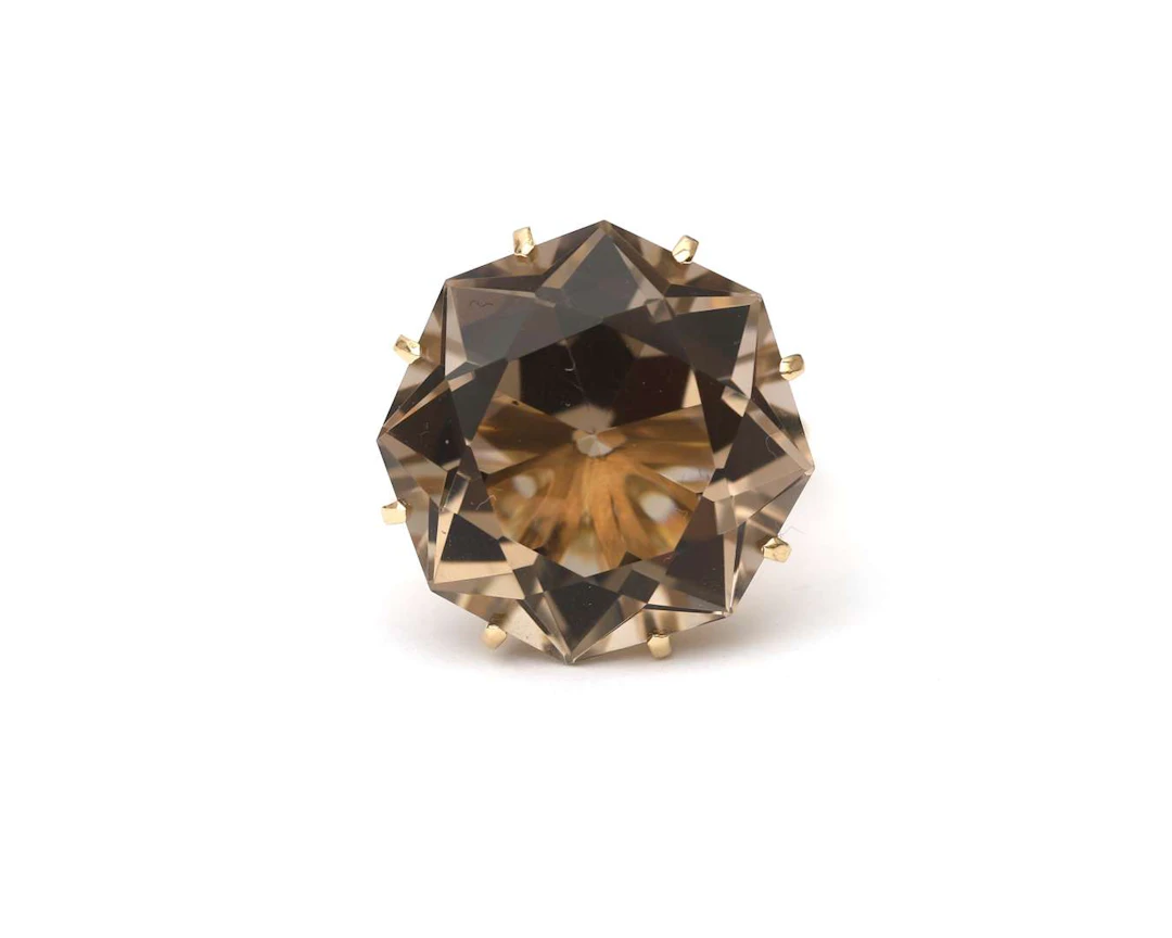 A 14k yellow gold ring with smoky quartz