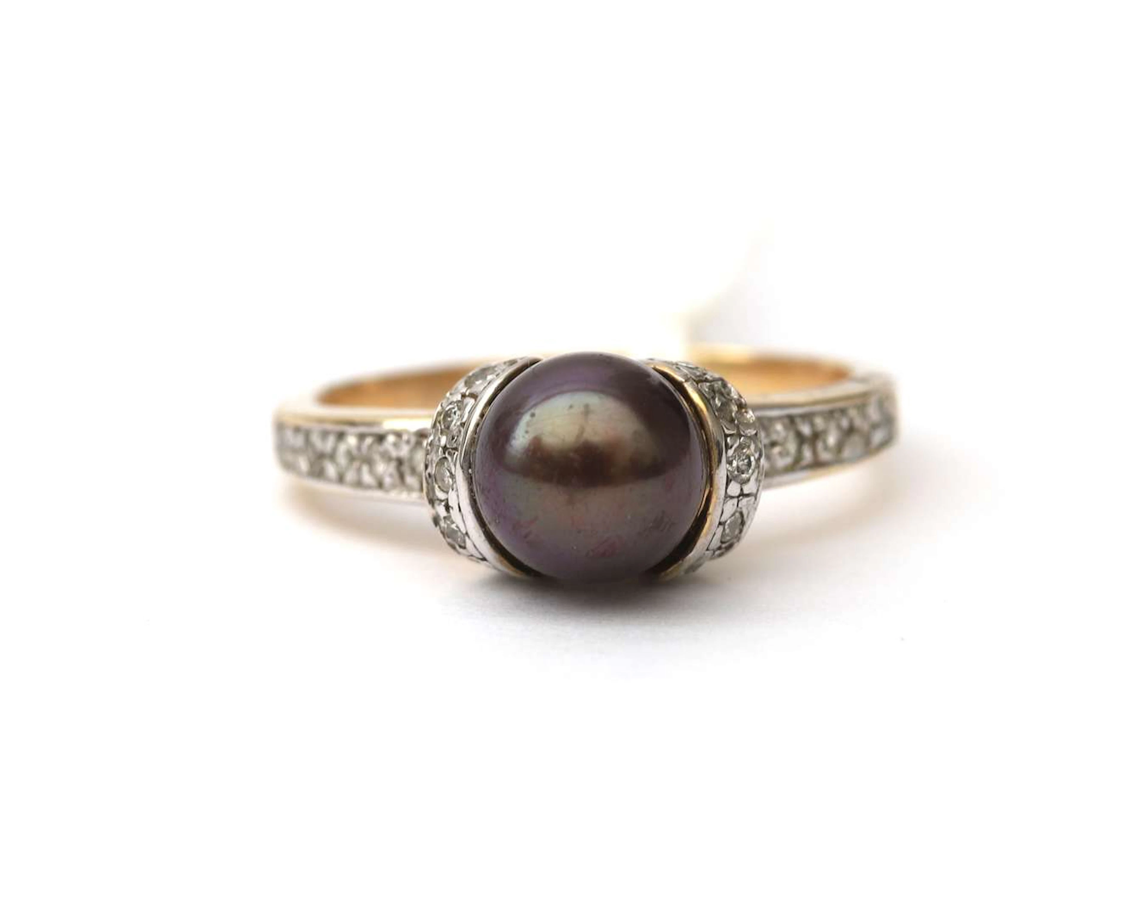 A 14k yellow gold ring with Tahiti pearl and diamonds