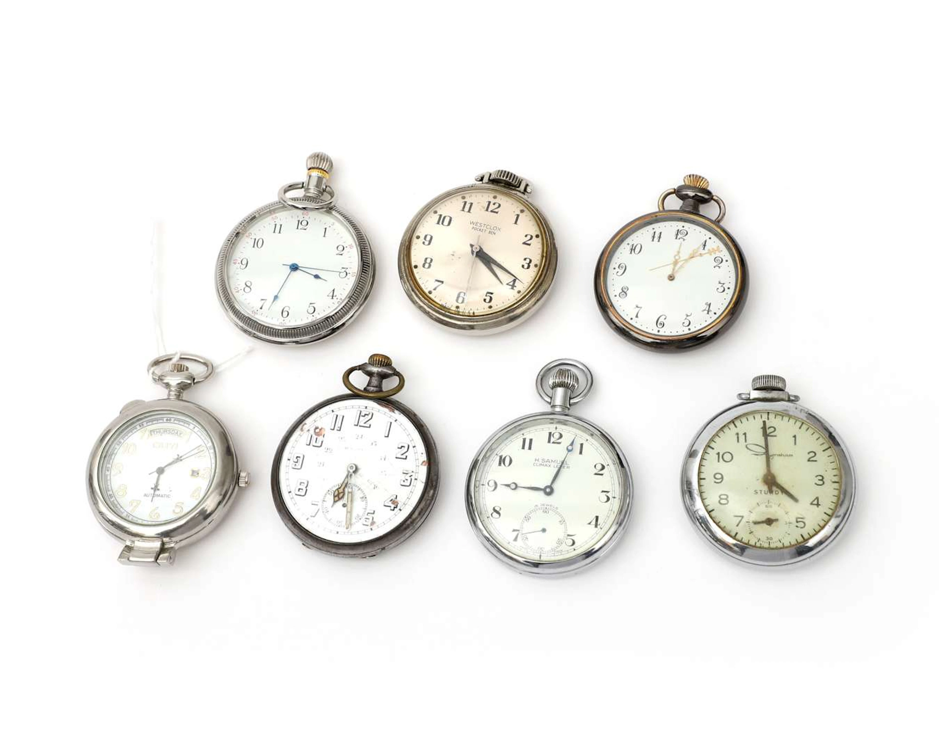 Seven pocket watches with steel cases