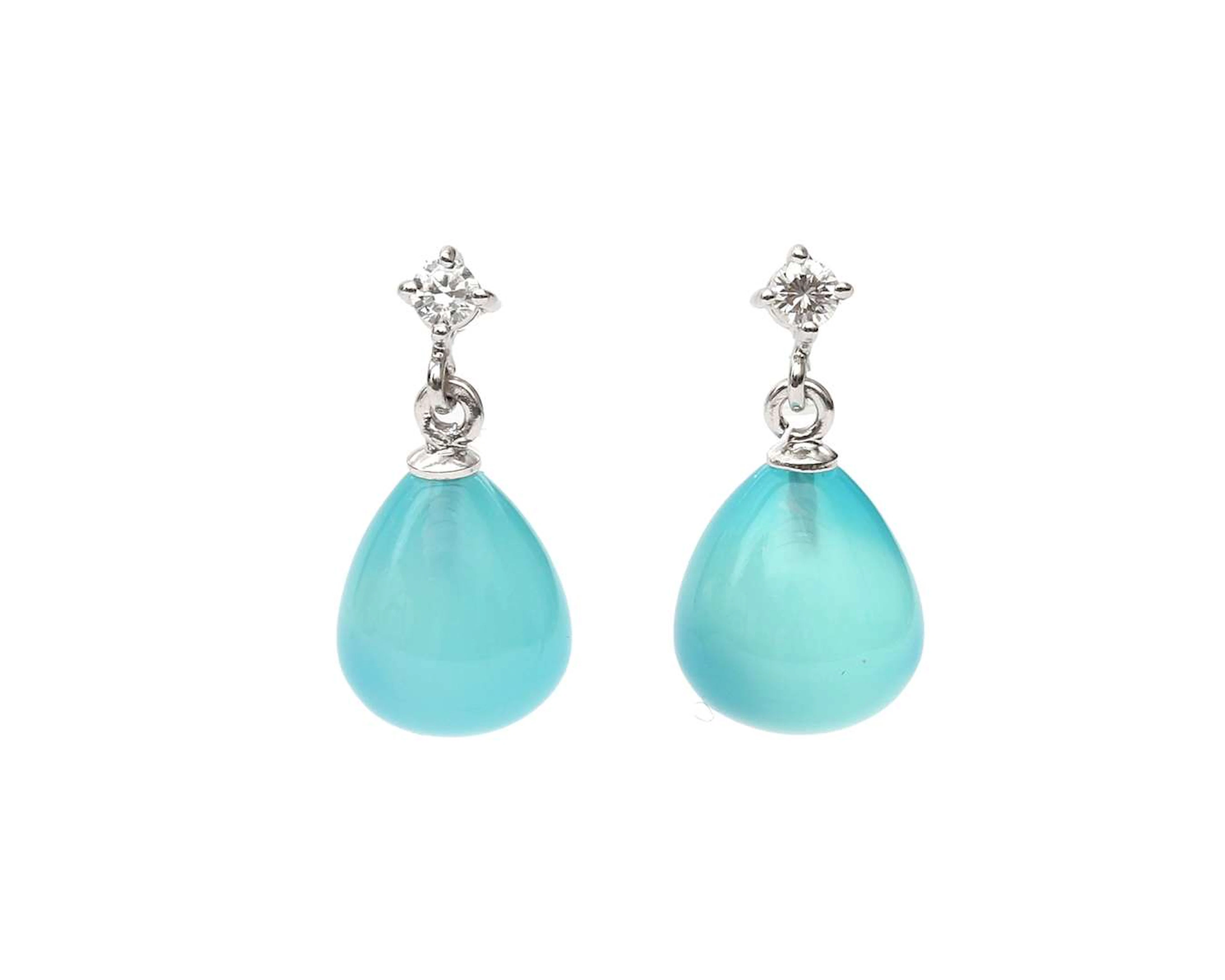 A pair of 18k white gold drop earrings with blue chalcedony and diamonds