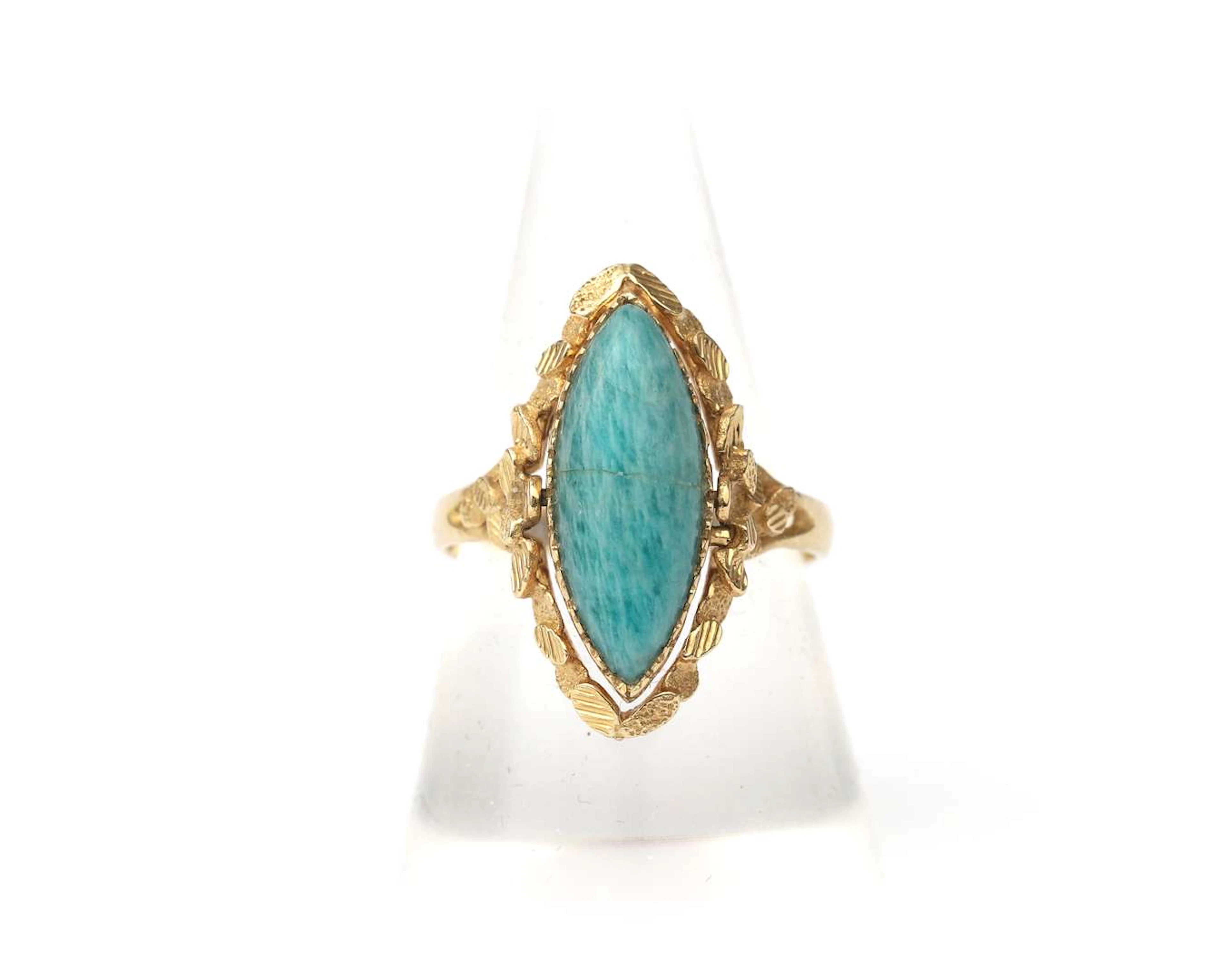 A 14 crt. yellow gold change ring with amazonite and blood coral