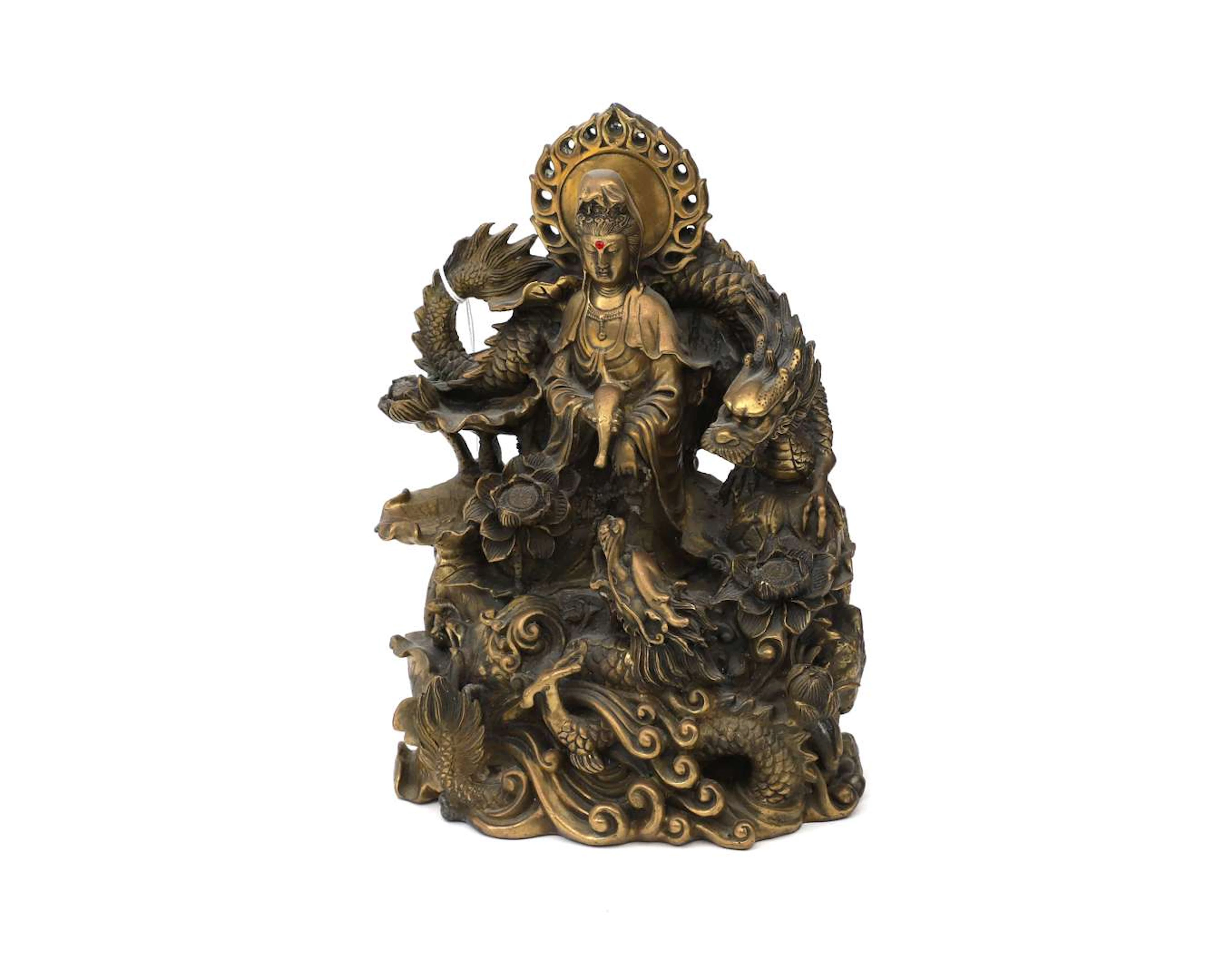 A brass statue. Guanyin Ssangyong (double dragon). China, 20th/21st century