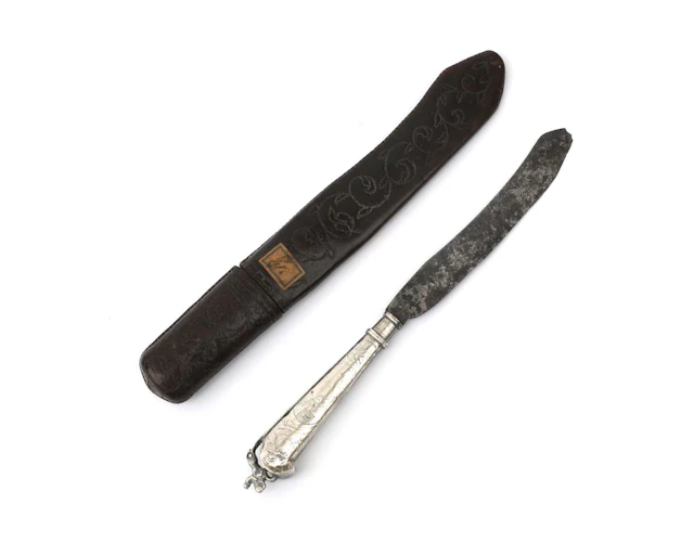 A silver knife in a leather sheath, Holland, 18th century