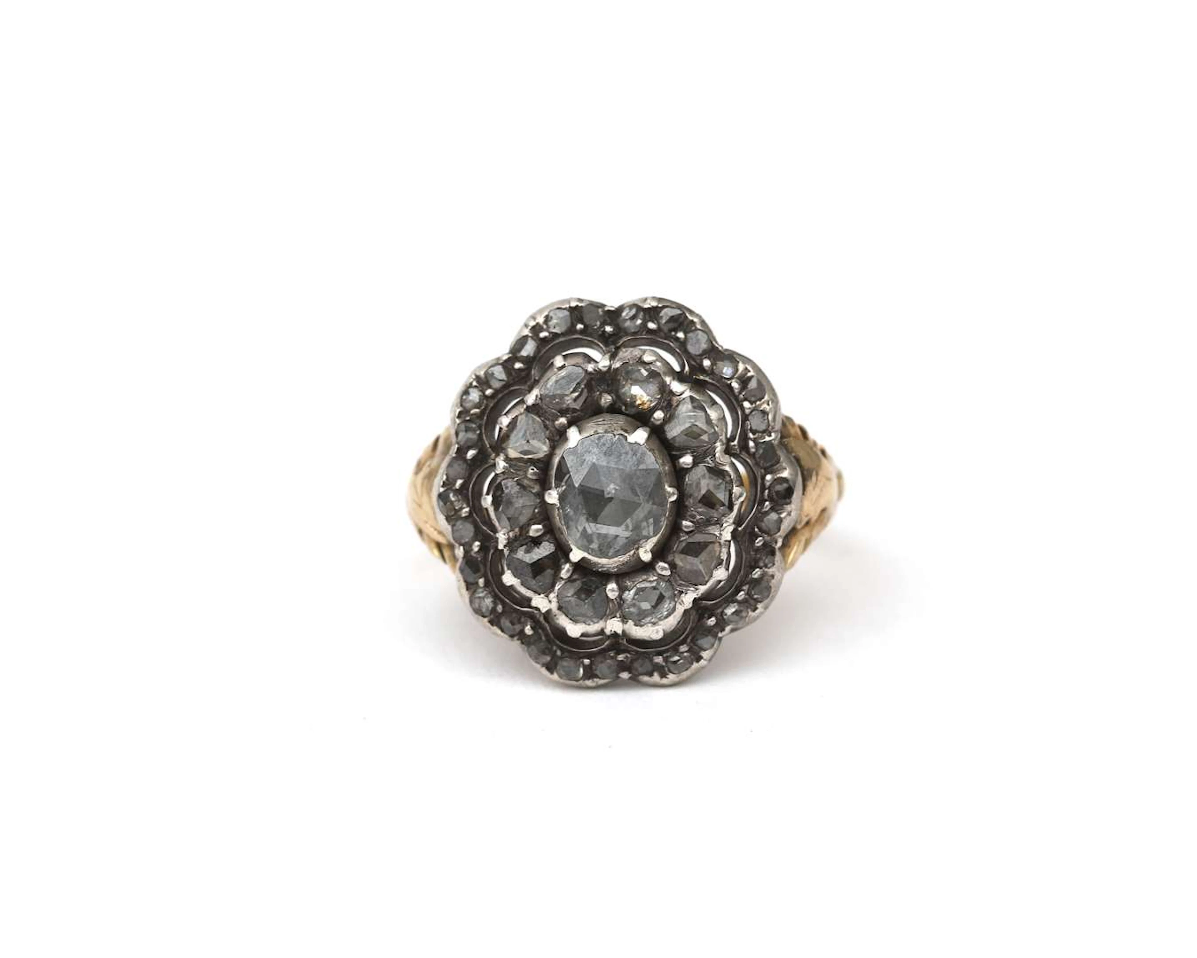 A 14k yellow gold and silver ring set with rose-cut diamonds