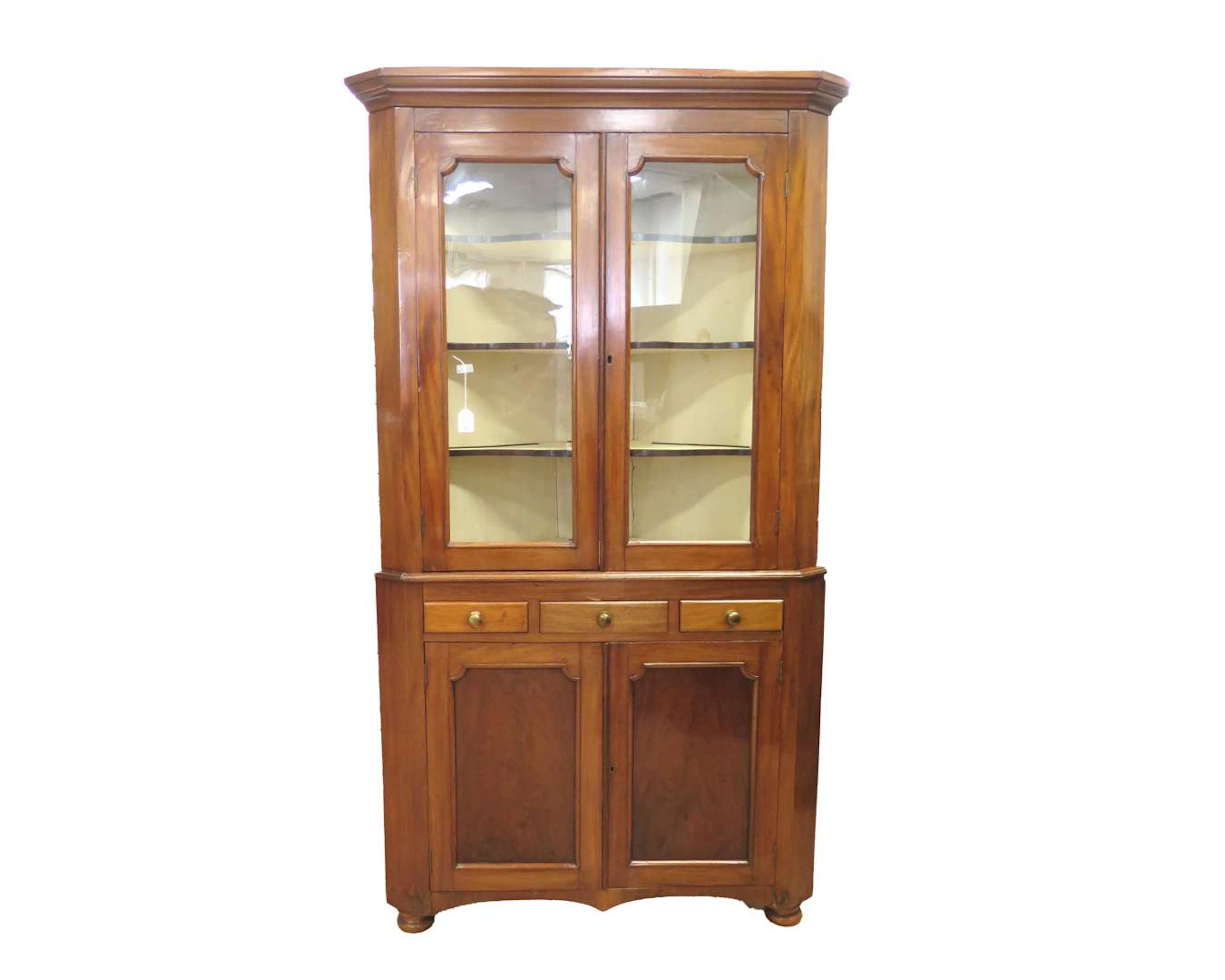 A mahogany corner cupboard, Holland, c. 1900
