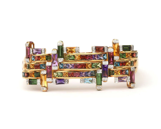 An 18k yellow gold Bellarri bangle bracelet set with coloured gemstones