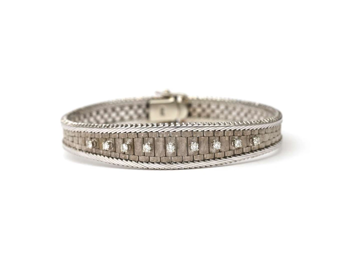 A 14k white gold bracelet with a diamond, from the 1970s