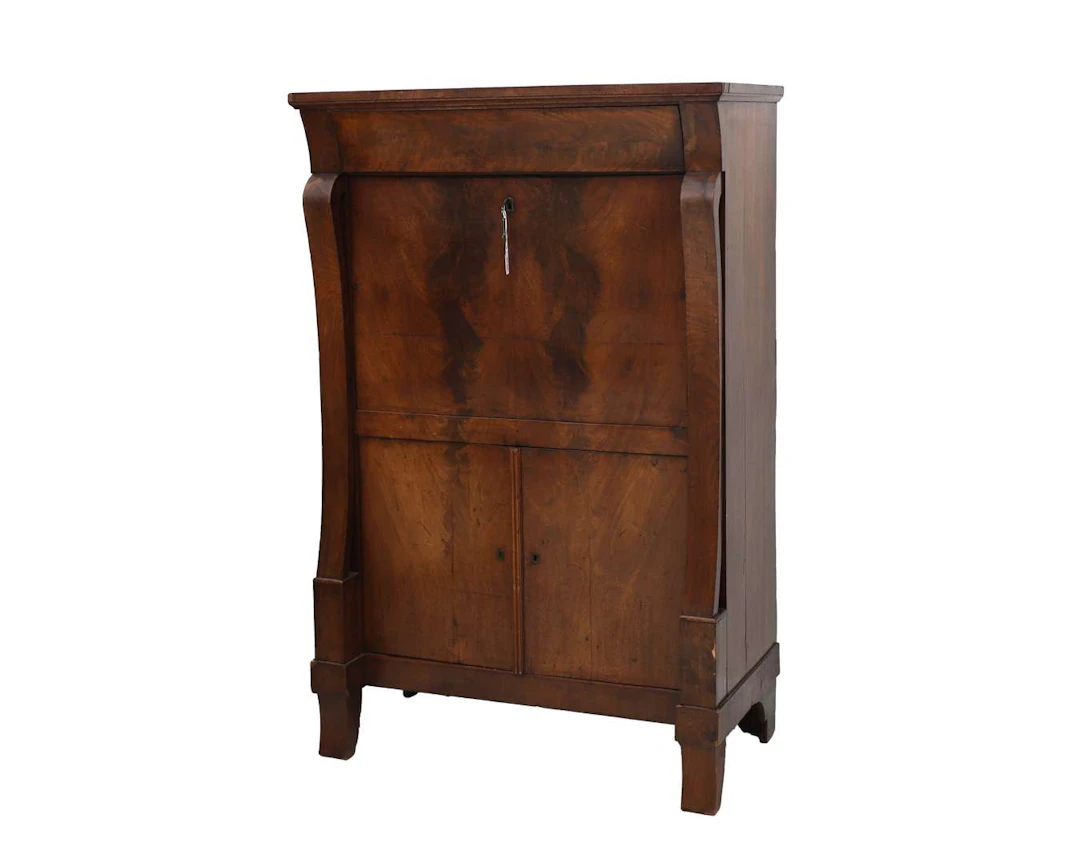 A mahogany secretaire a abbetant with volute-shaped pillars. Holland