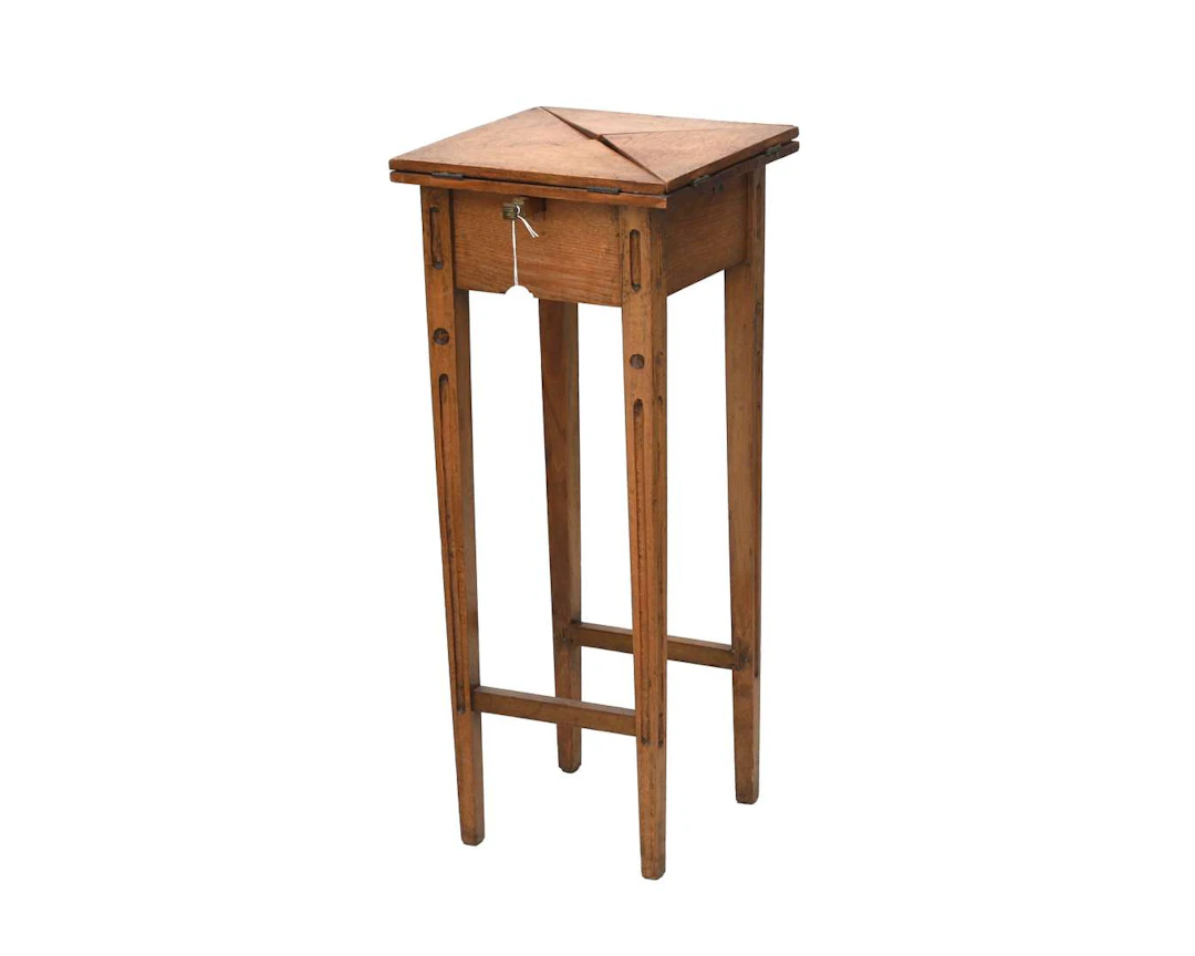 An oak games table, 20th century