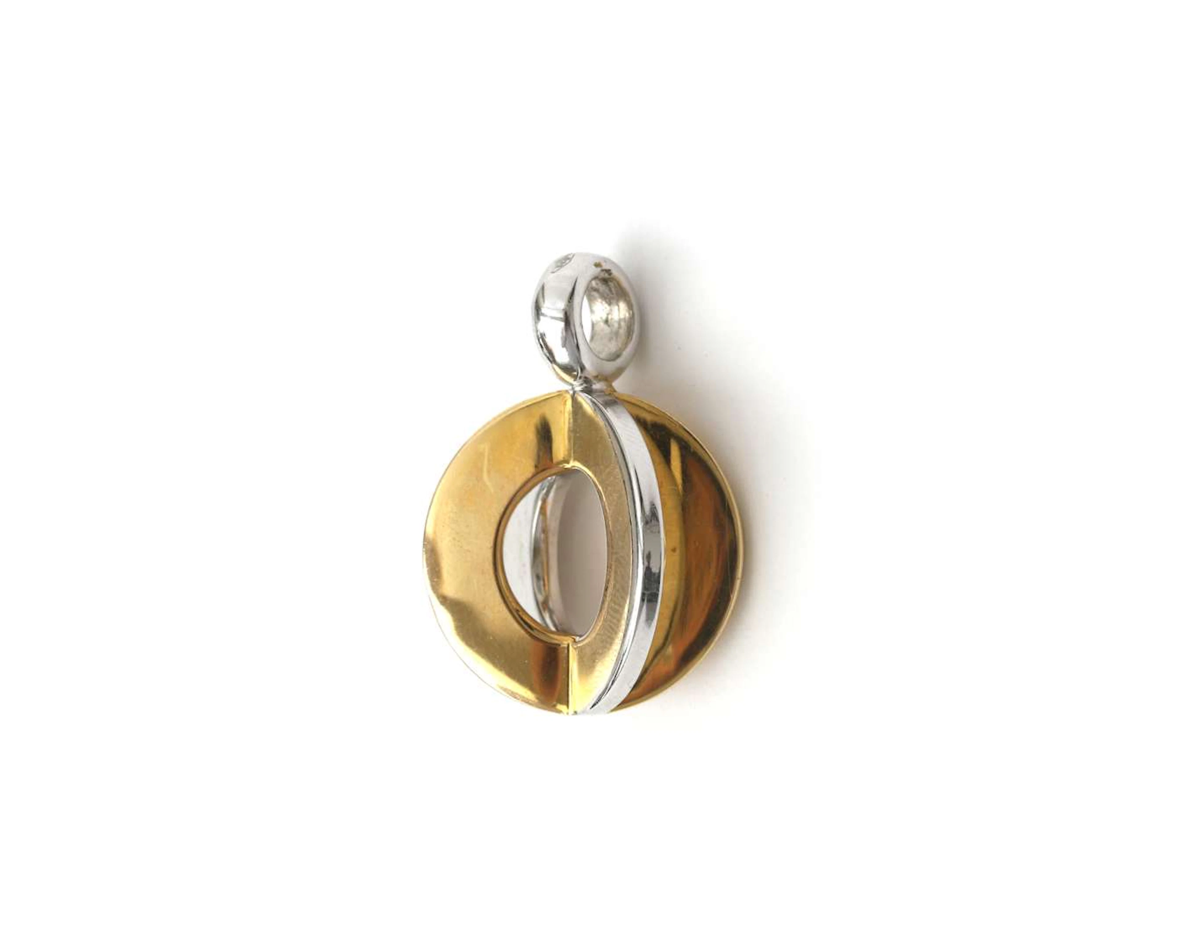 A 14k two-tone gold pendant