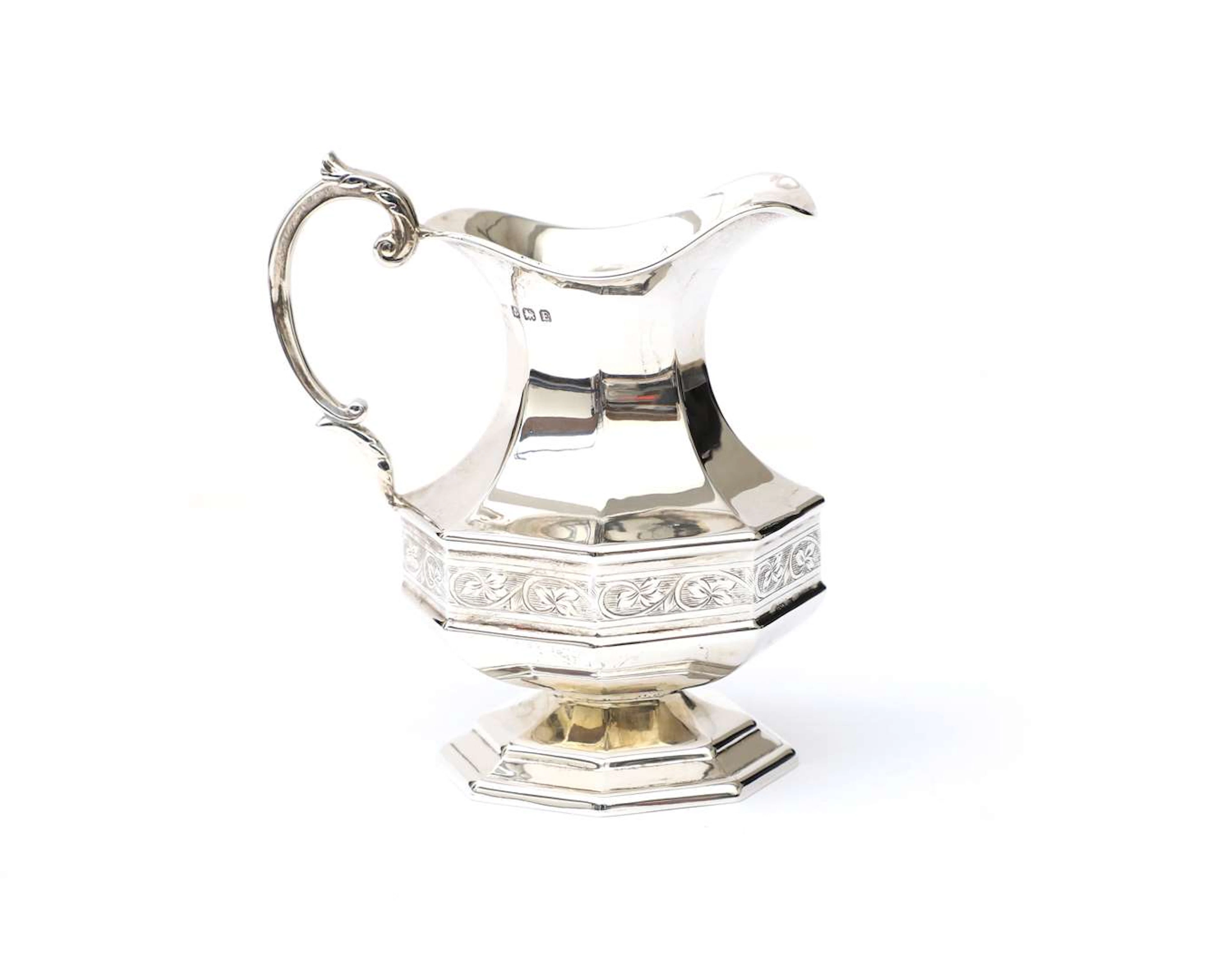 A silver cream jug, England, Birmingham, 1929