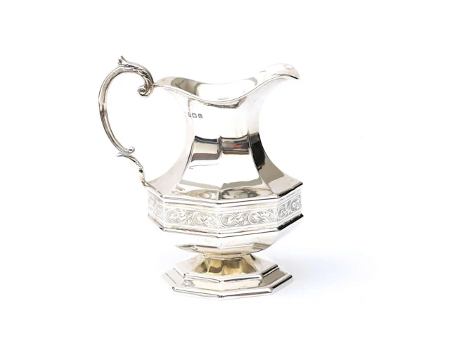 A silver cream jug, England, Birmingham, 1929
