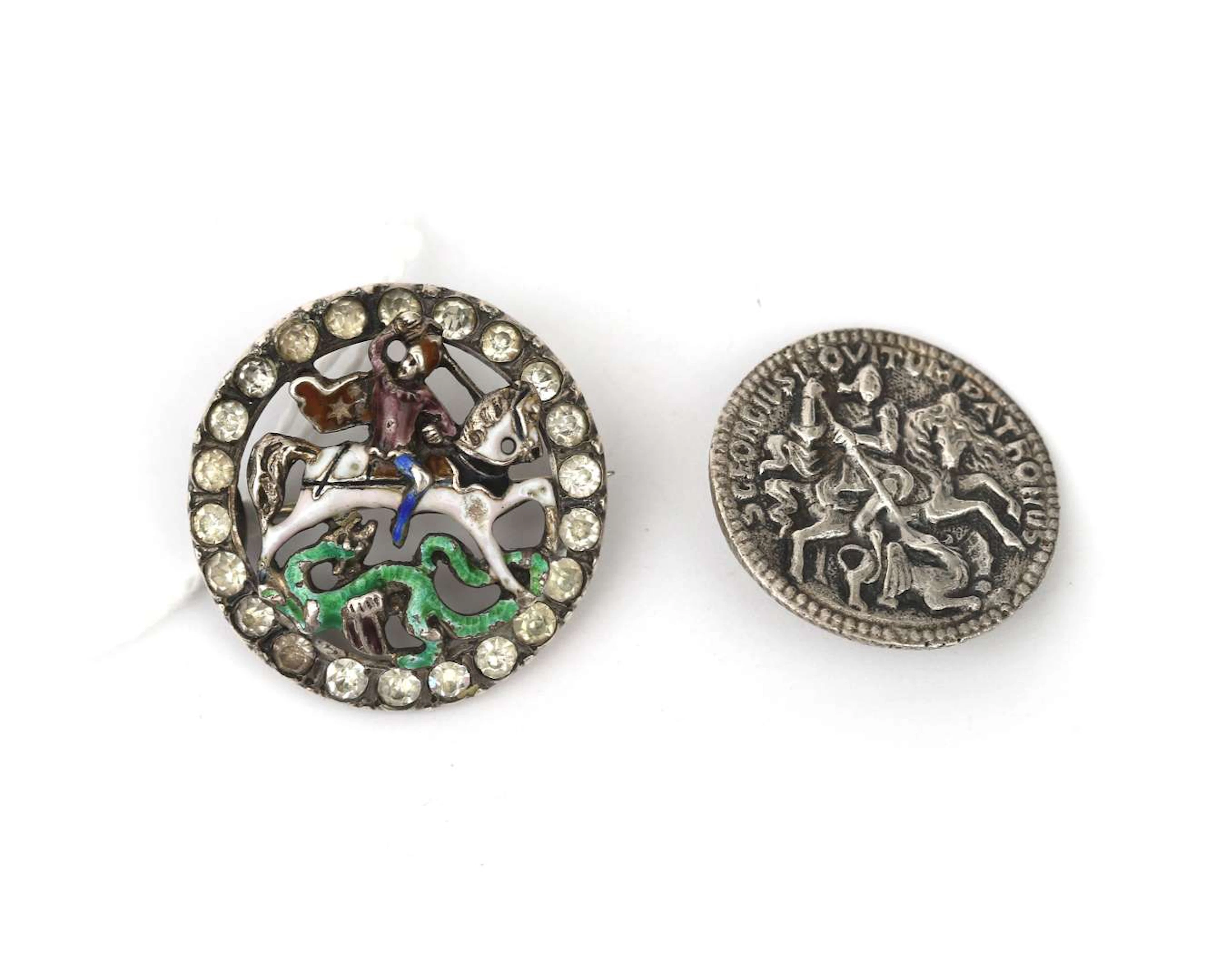 A silver enamelled brooch depicting St George and the dragon
