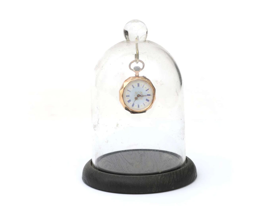 A 14 crt. rose gold ladies pocket watch