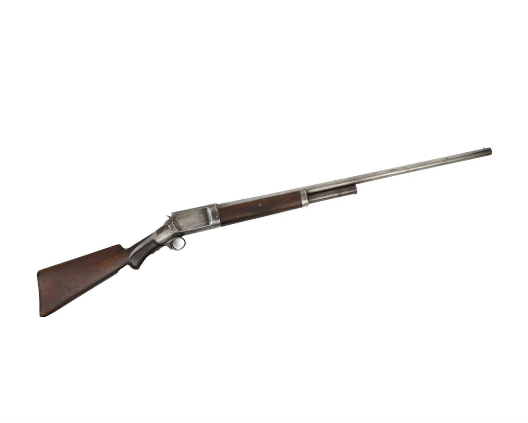A slide-action rifle, manufactured by: Burgerss Gun Co, USA, 1892–1899