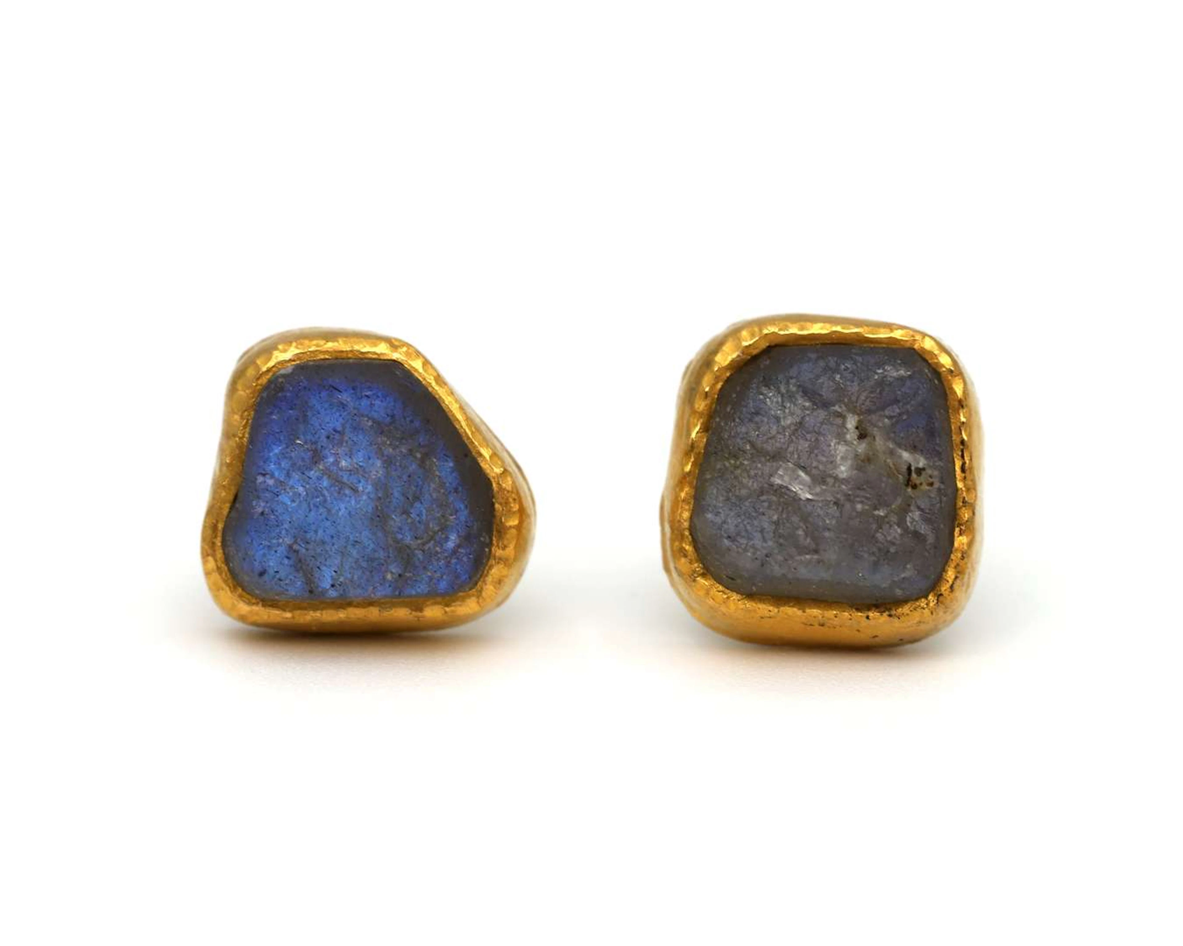A pair of 14k yellow gold ear studs with labradorite