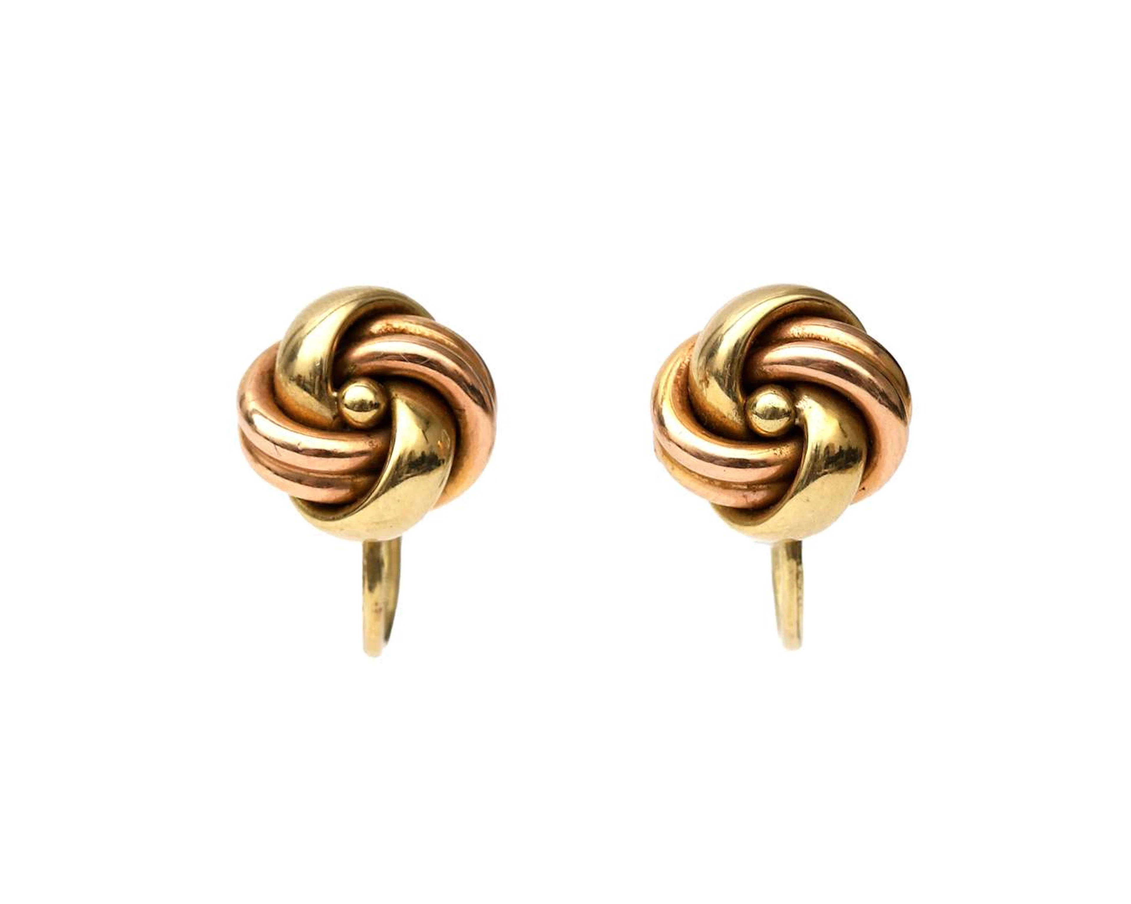 A pair of 14k two-tone screw-back stud earrings
