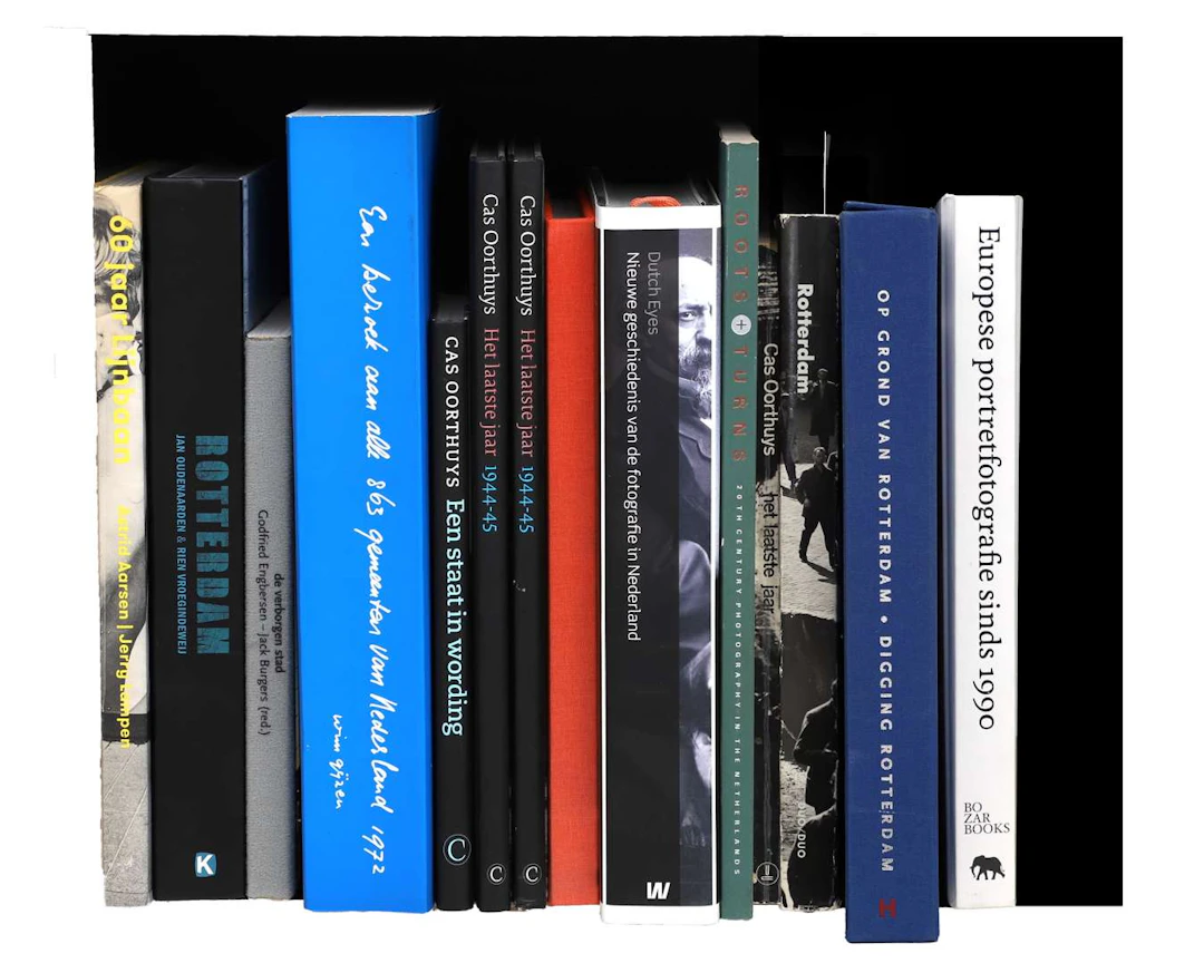 A collection of 13 photography books, including a collection of books