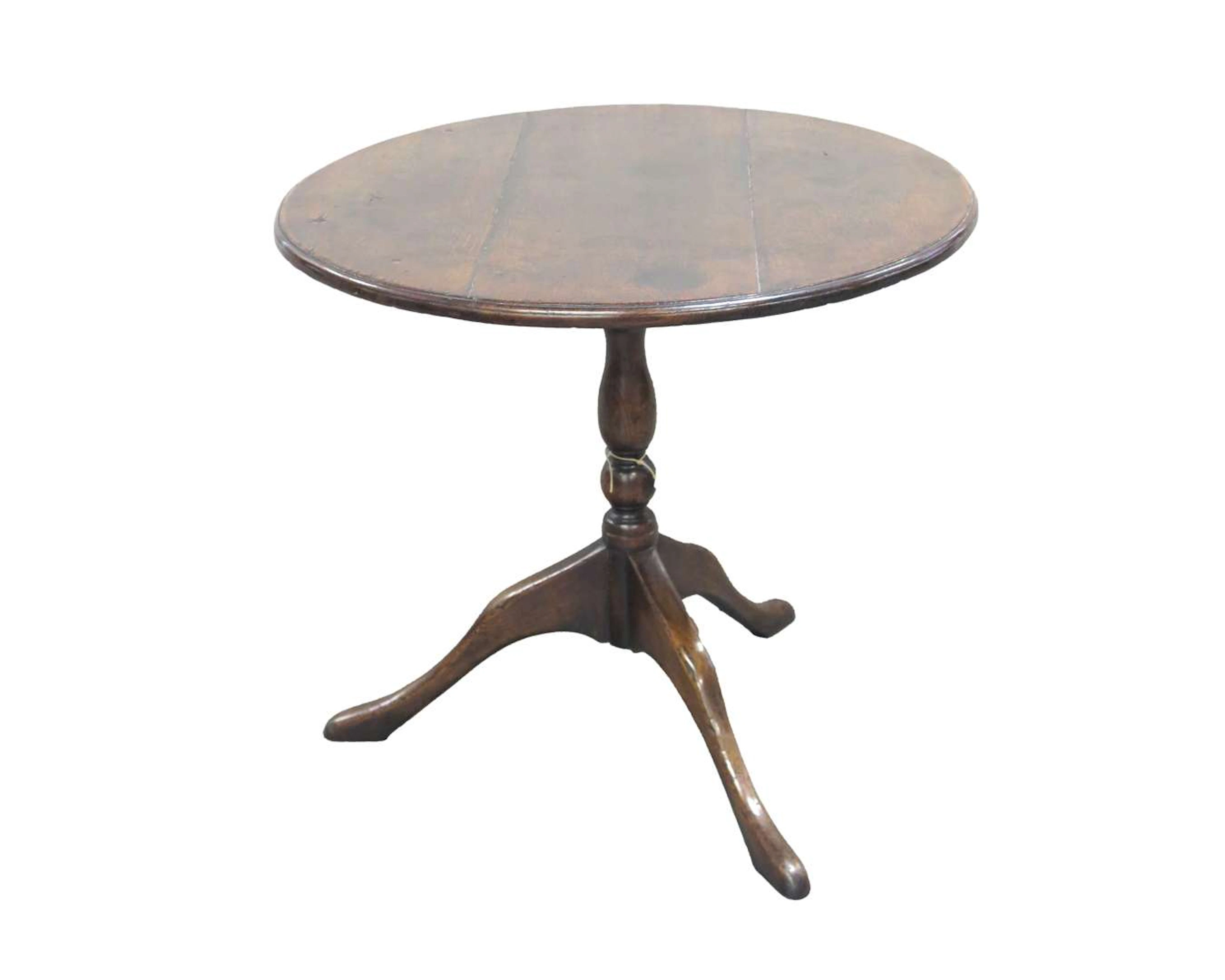 A round oak side table. 19th century