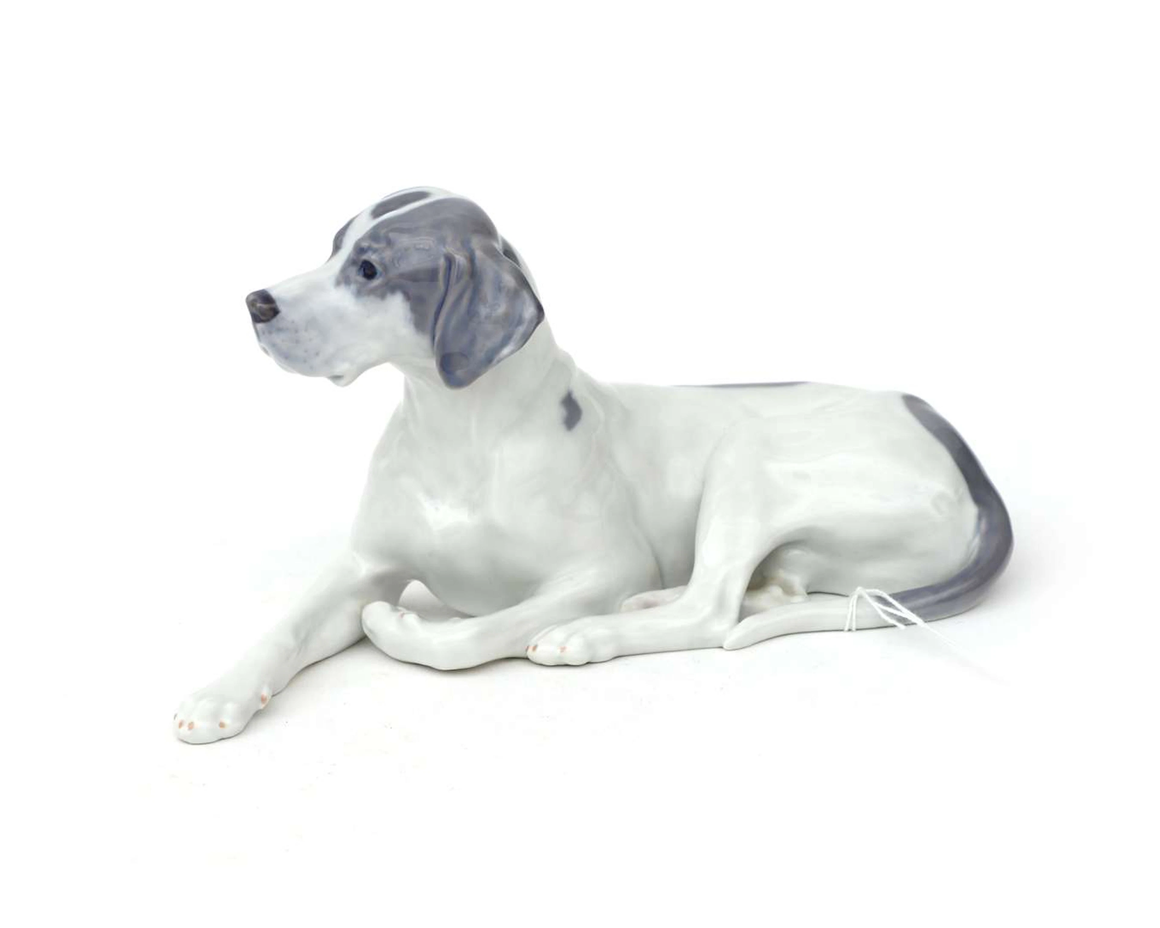 A coloured porcelain figurine. Royal Copenhagen, model no. 1635. Denmark