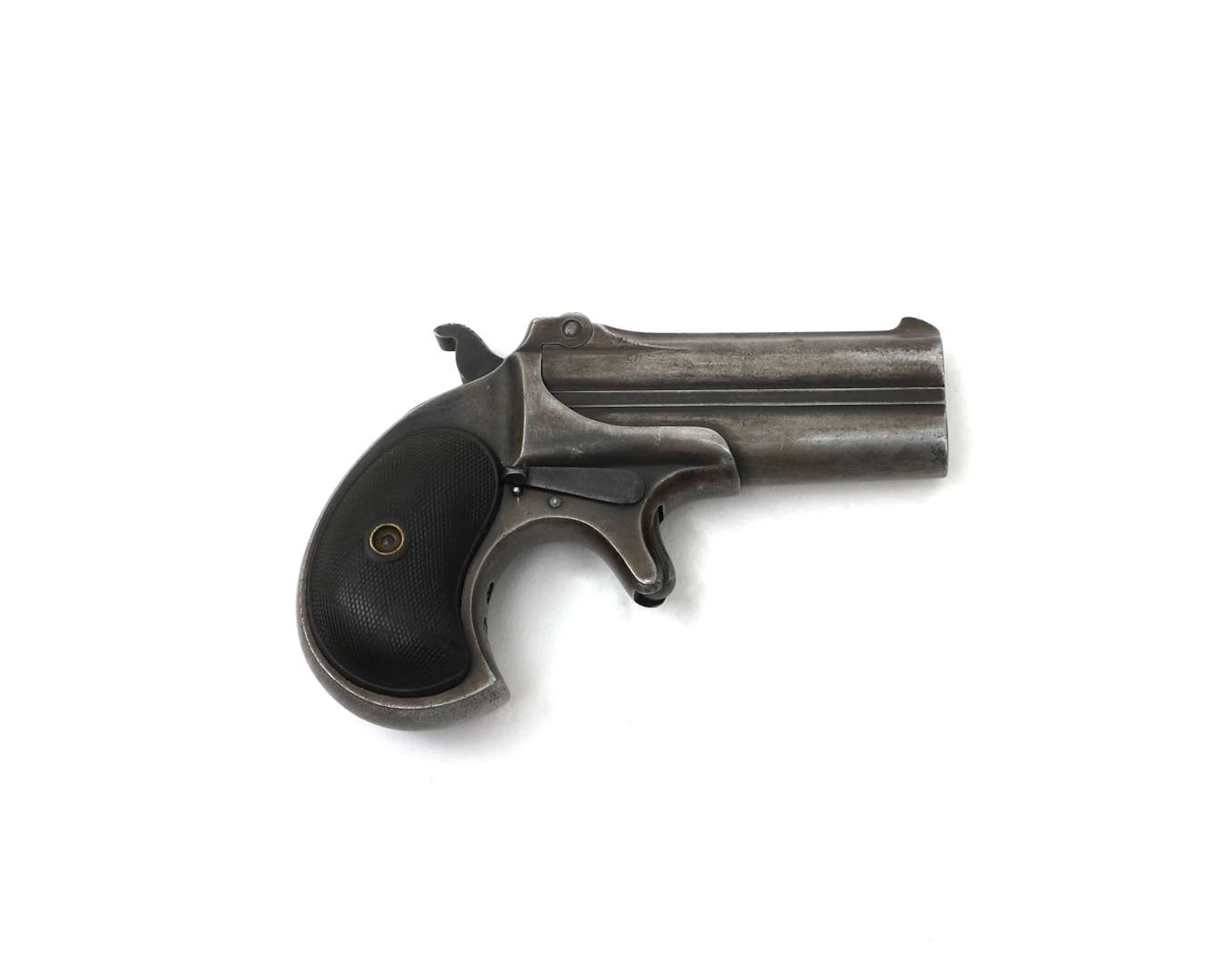 A double-barrelled Derringer pistol, manufactured by: Remington Arms