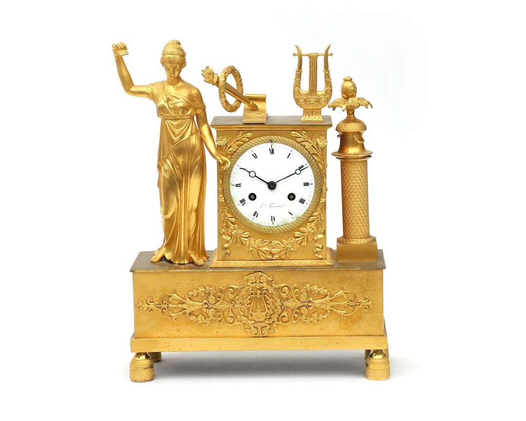A bronze gilt empire mantle clock, France, c. 1820