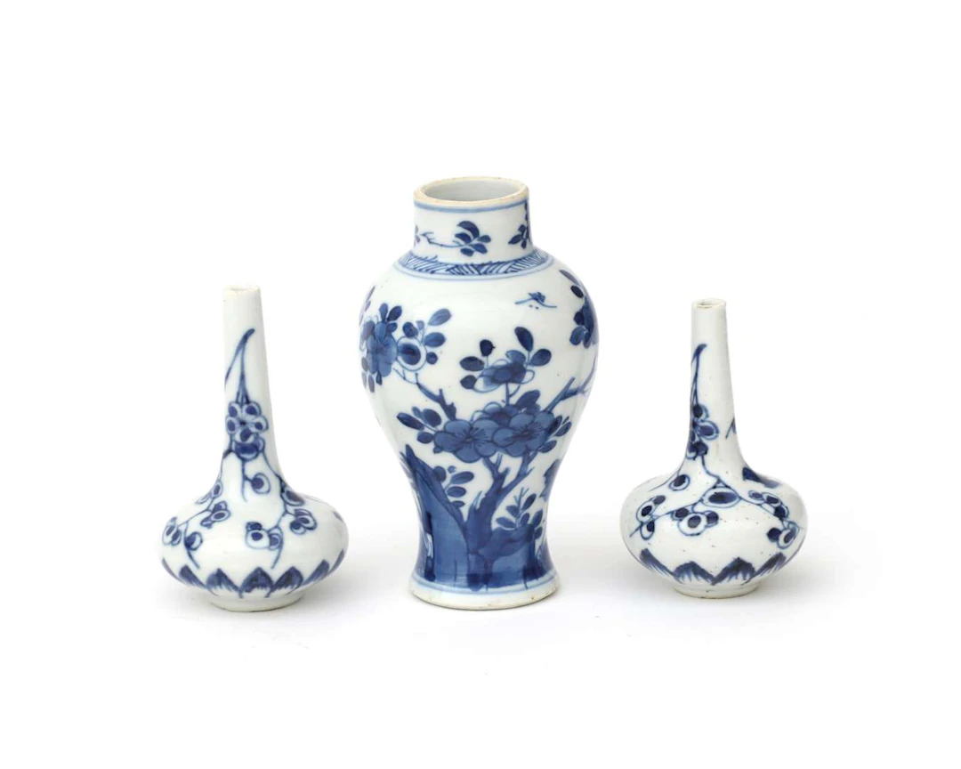 Two porcelain rosewater sprinklers and a vase, China, 18th century