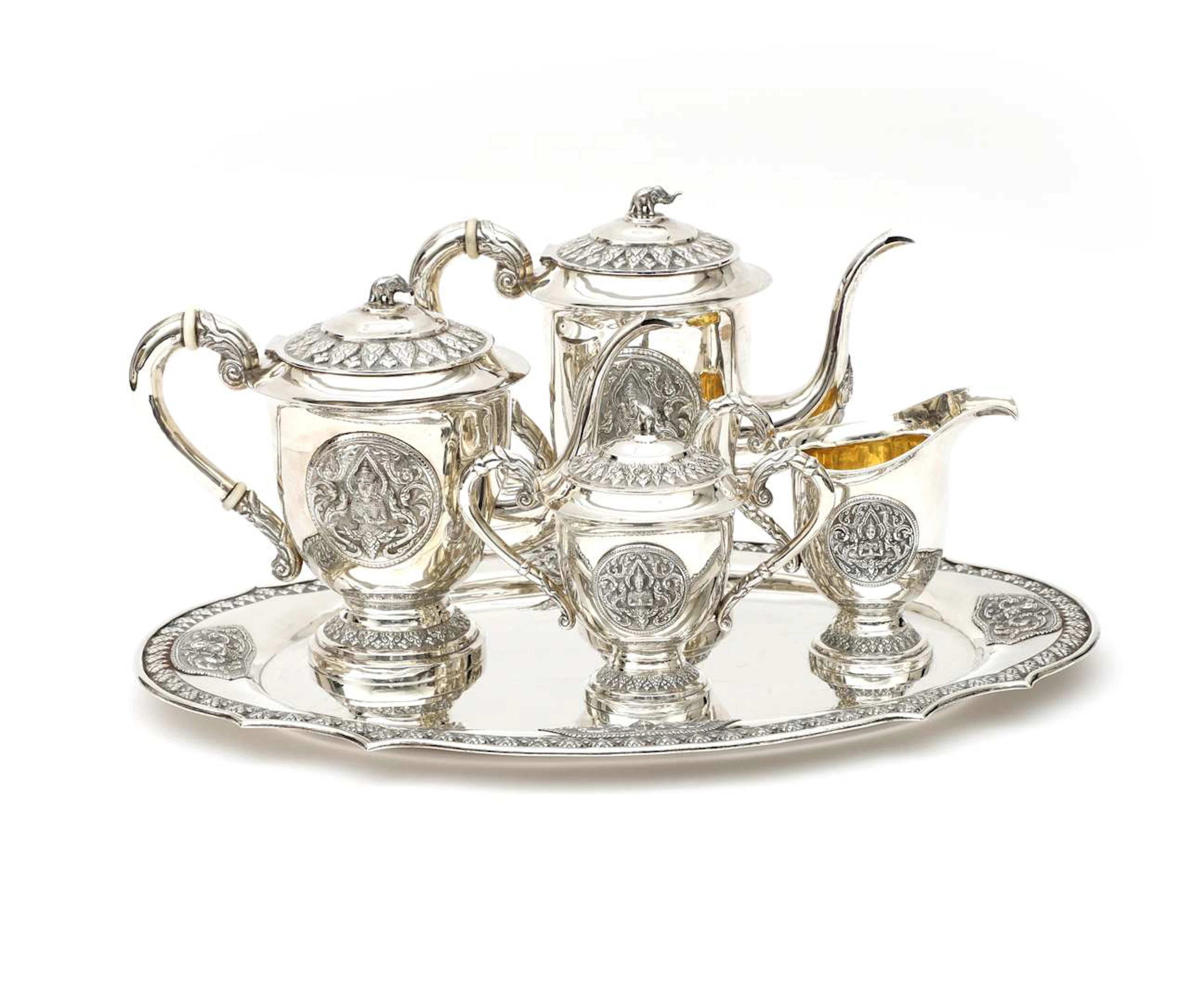 A five-piece silver coffee and tea service, Thailand, 20th century