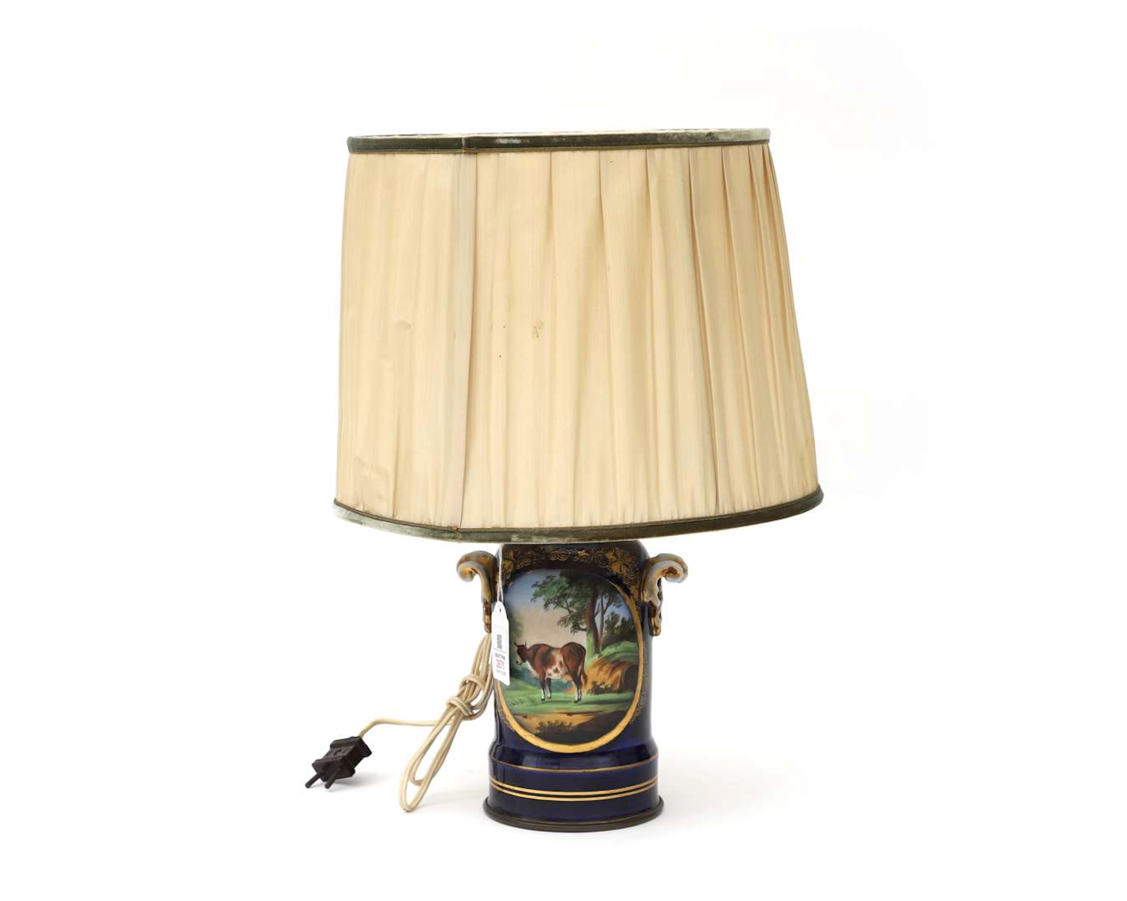 A table lamp with an earthenware shade, 20th century