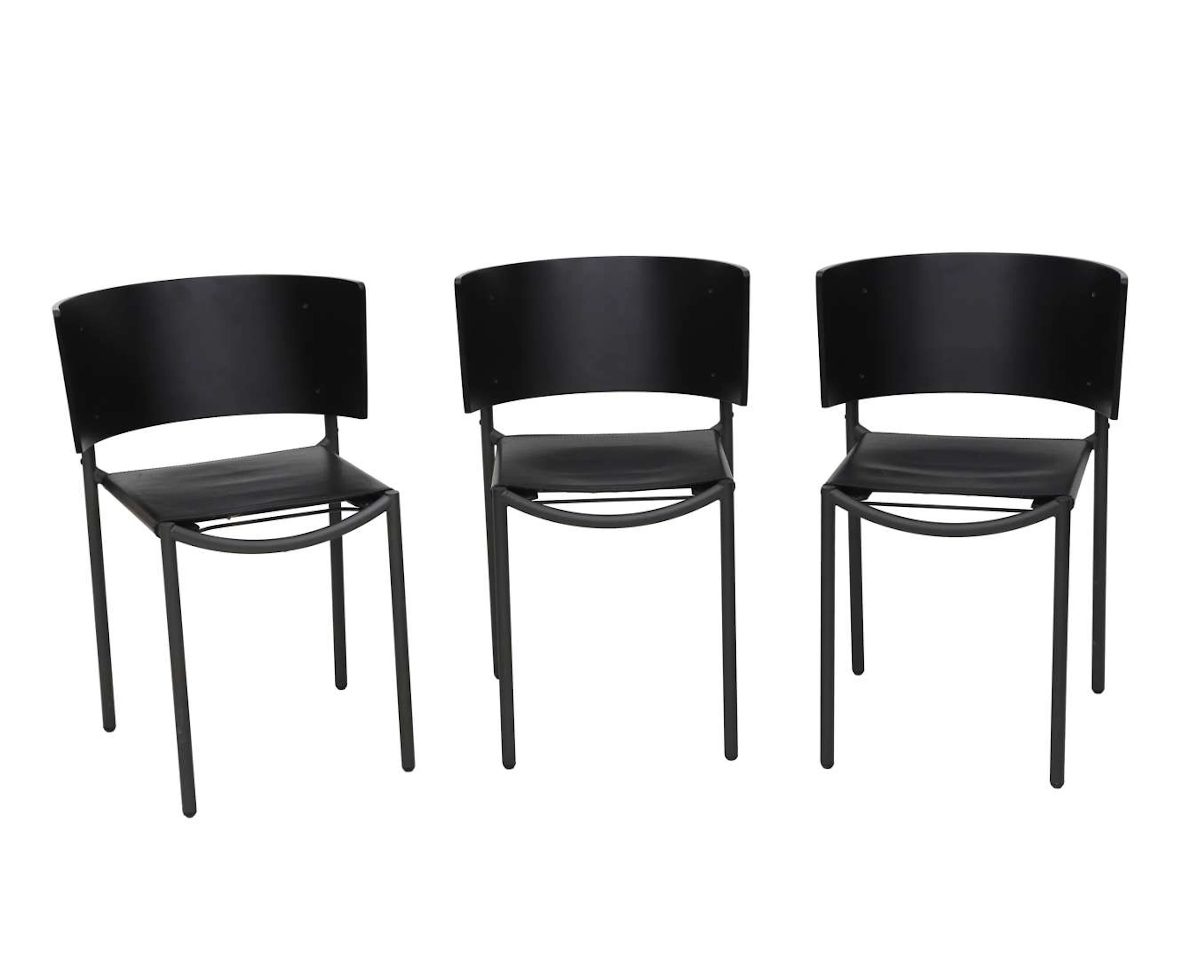 Set of three grey lacquered metal chairs with black leather seats