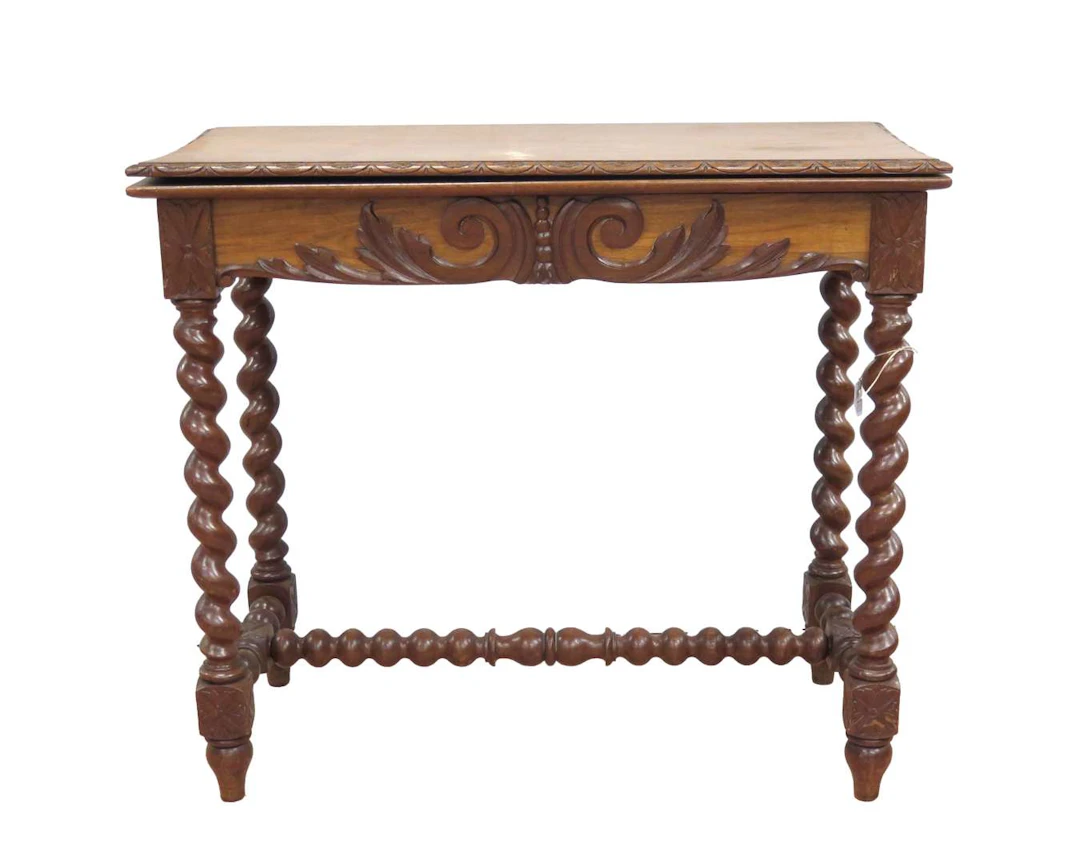 An oak games table with twisted legs. First half of the 20th century