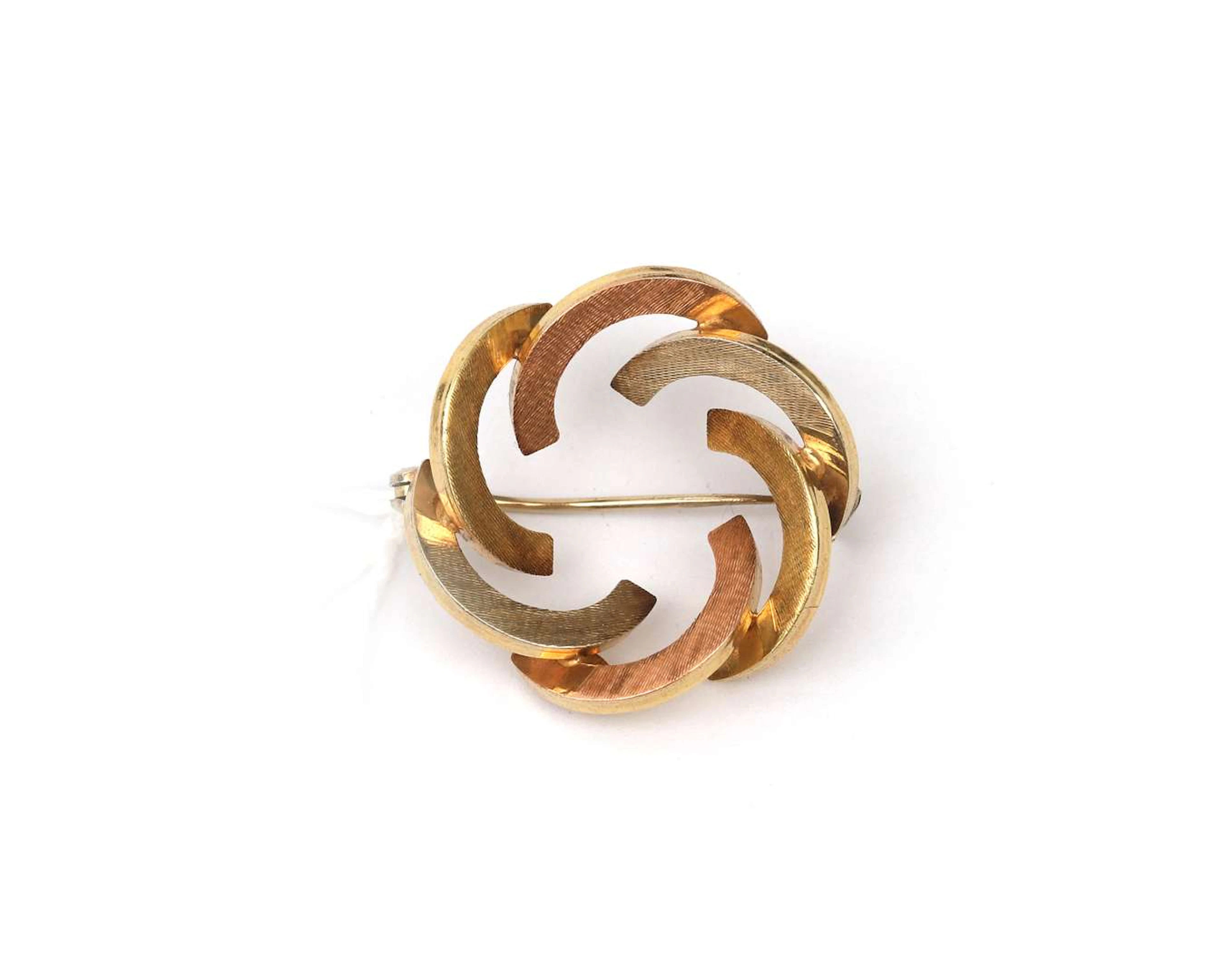 A 14k tricolour gold brooch