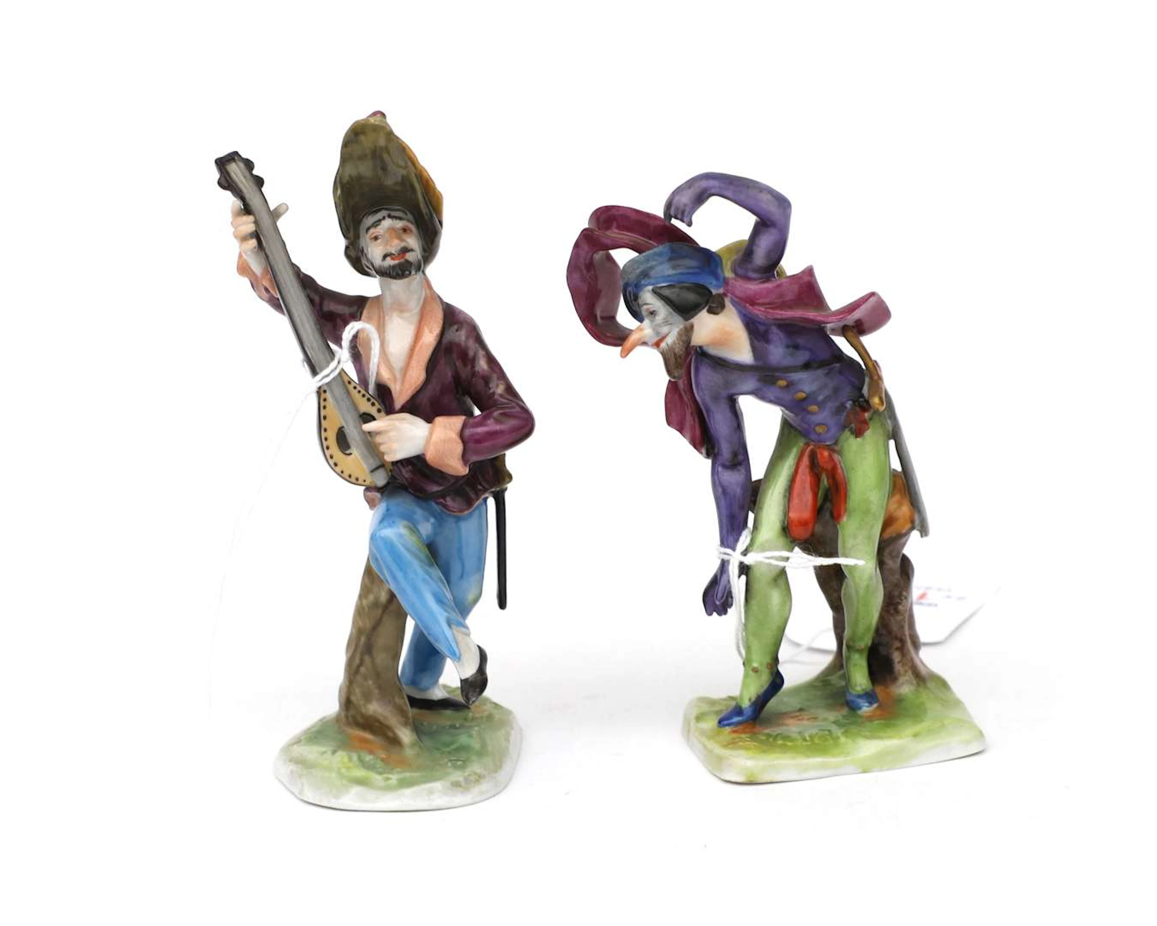 Two porcelain figurines of a musician and a jester, Rudolstadt-Volkstedt