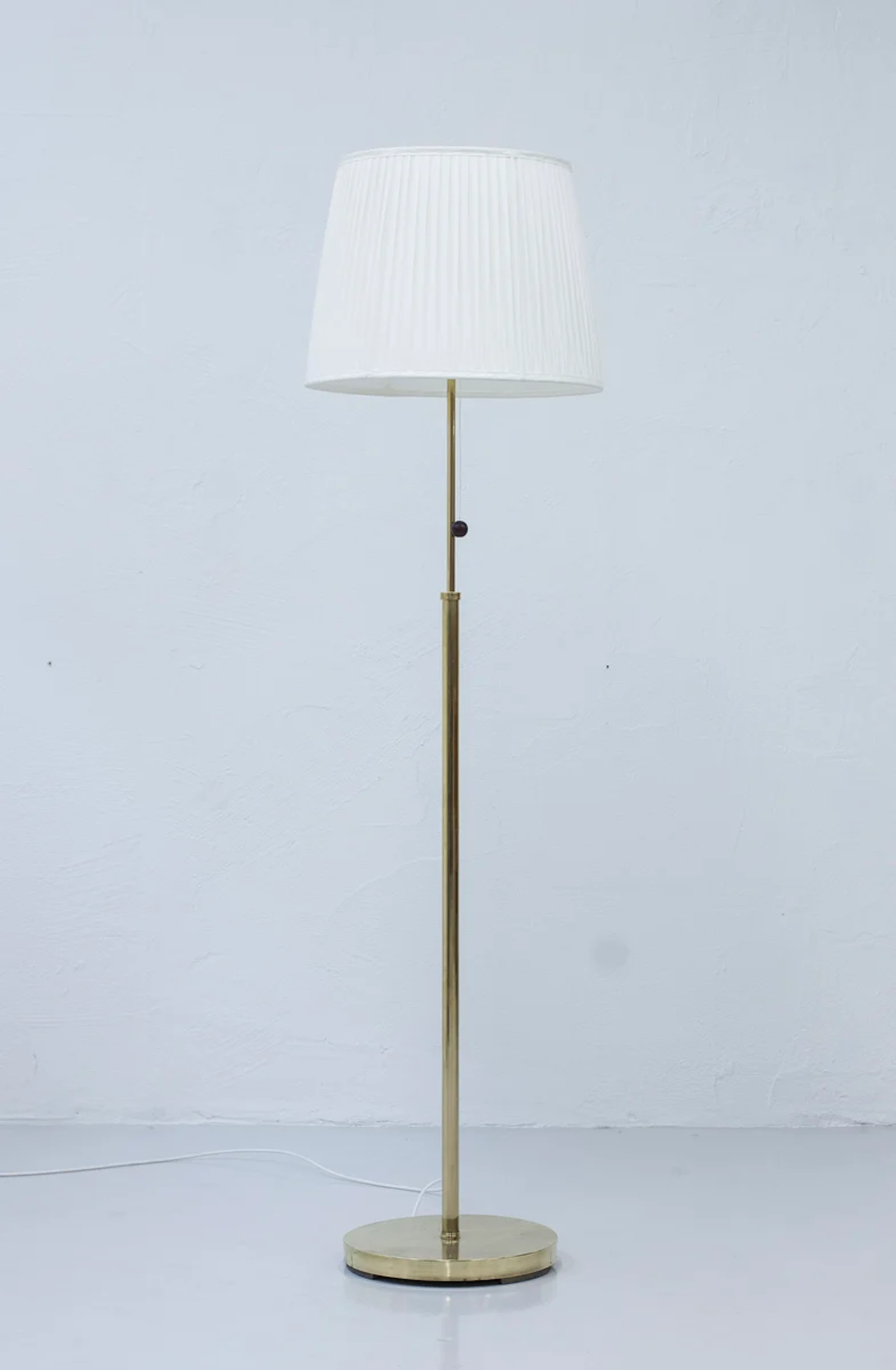 Swedish modern brass floor lamp