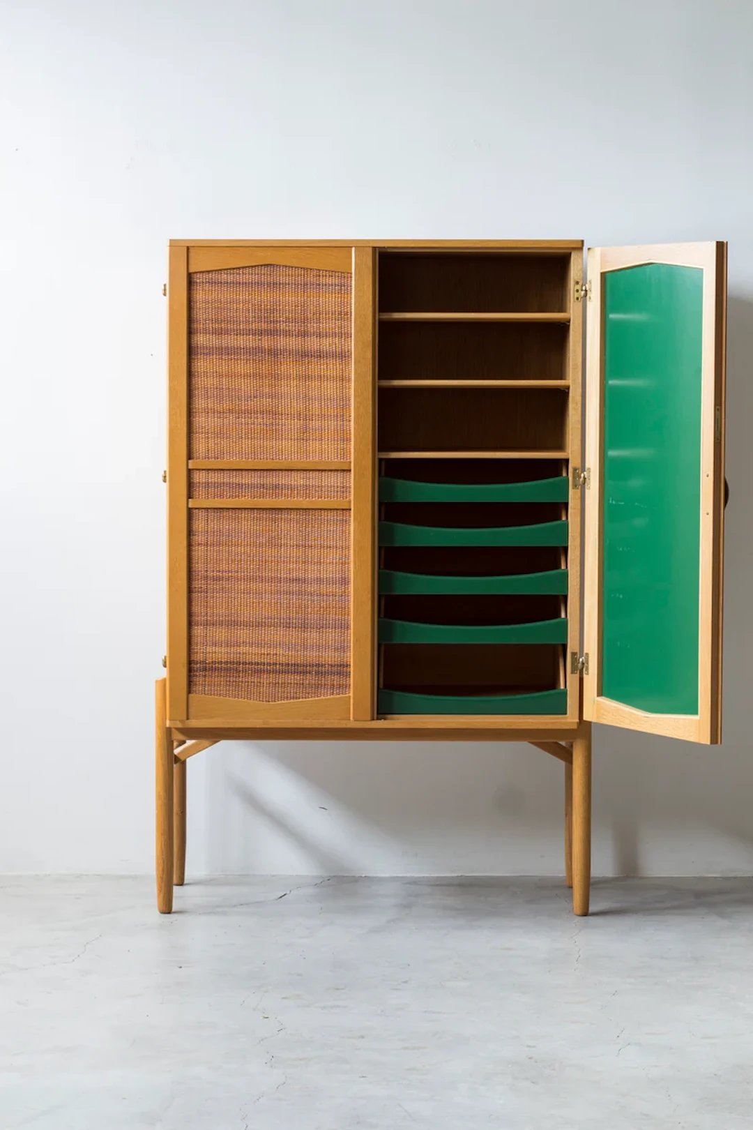 Swedish 1950s cabinet with cane and green lacquer