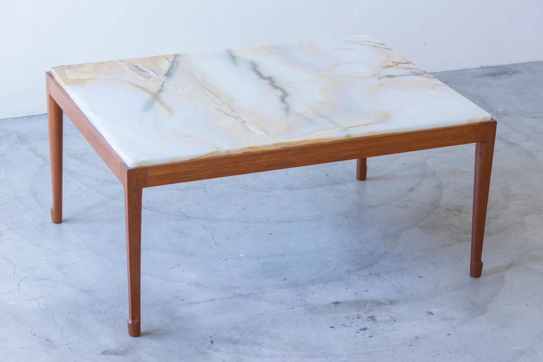 Onyx sofa table in the style of Frank
