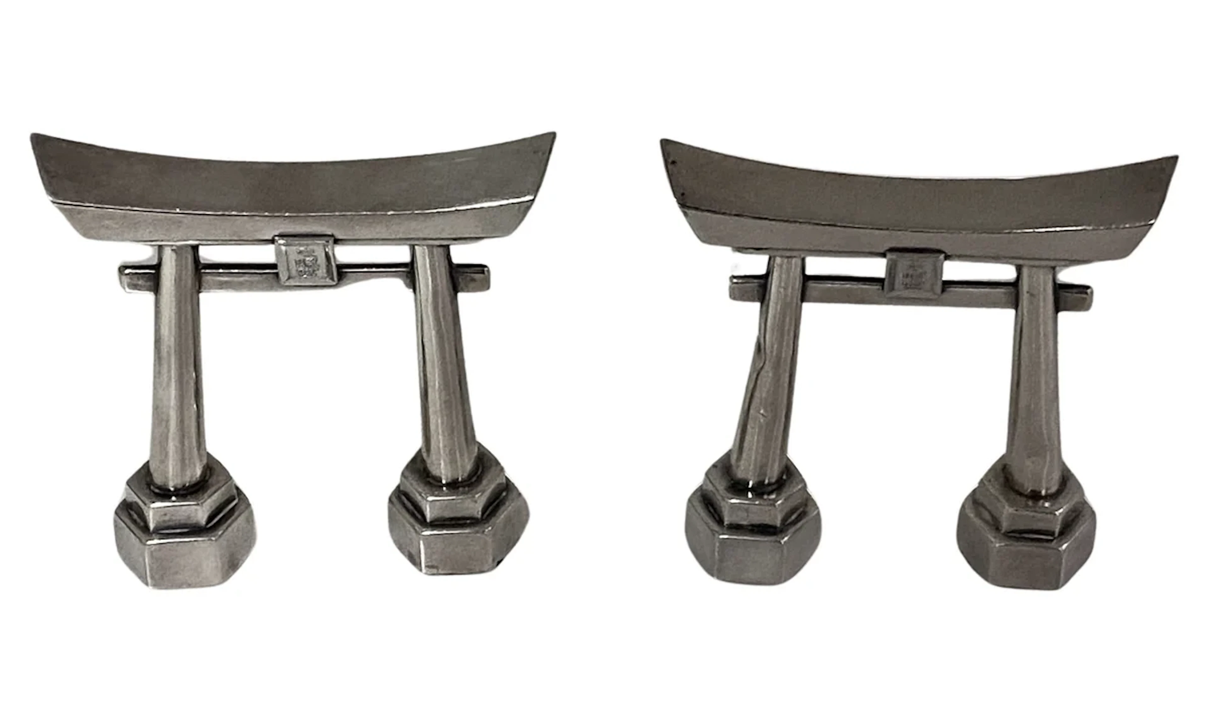 Pair of Sterling Silver Shinto Gates Casters C.1950.