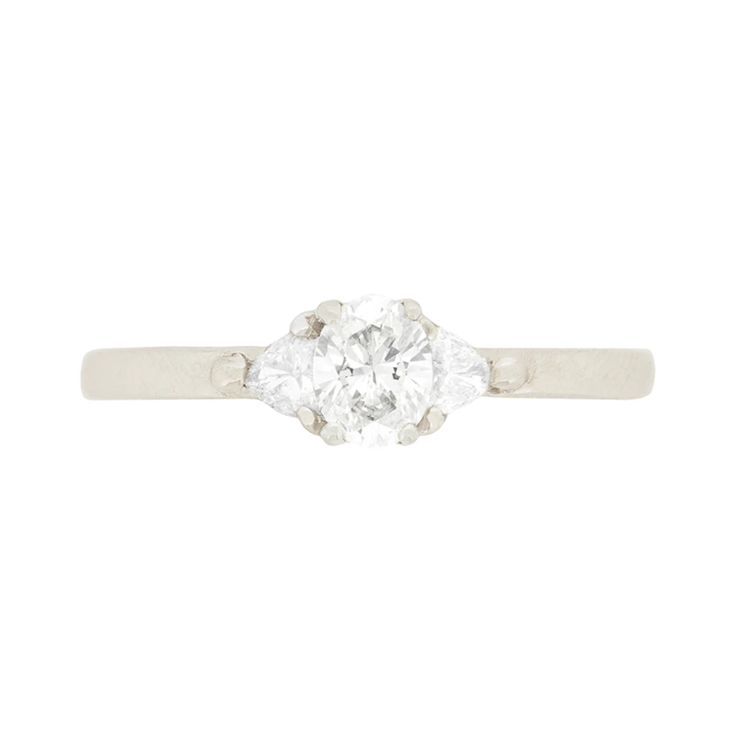 Contemporary 0.30ct Oval and Trillion Cut Diamond Solitaire Engagement Ring