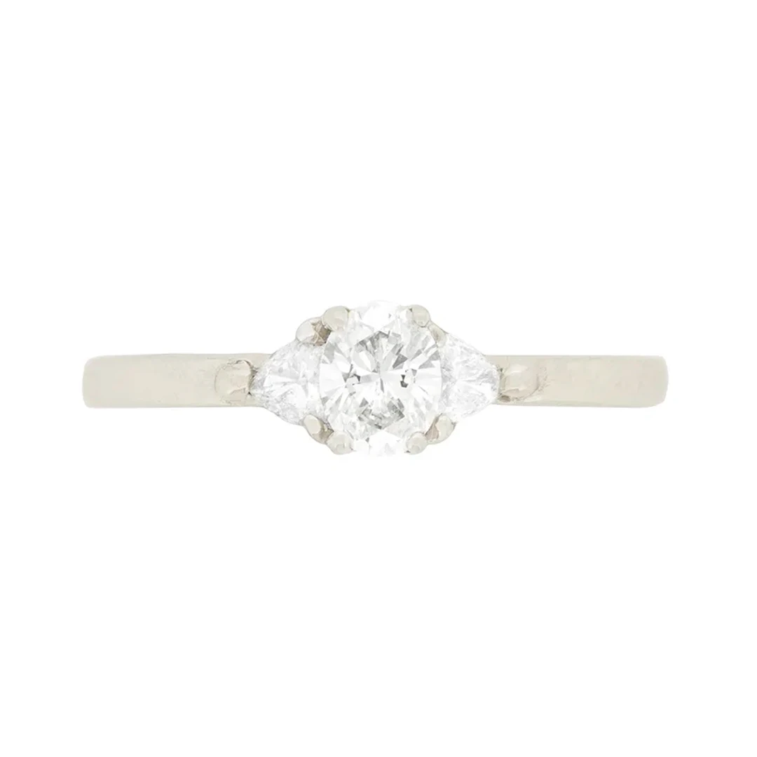 Contemporary 0.30ct Oval and Trillion Cut Diamond Solitaire Engagement Ring