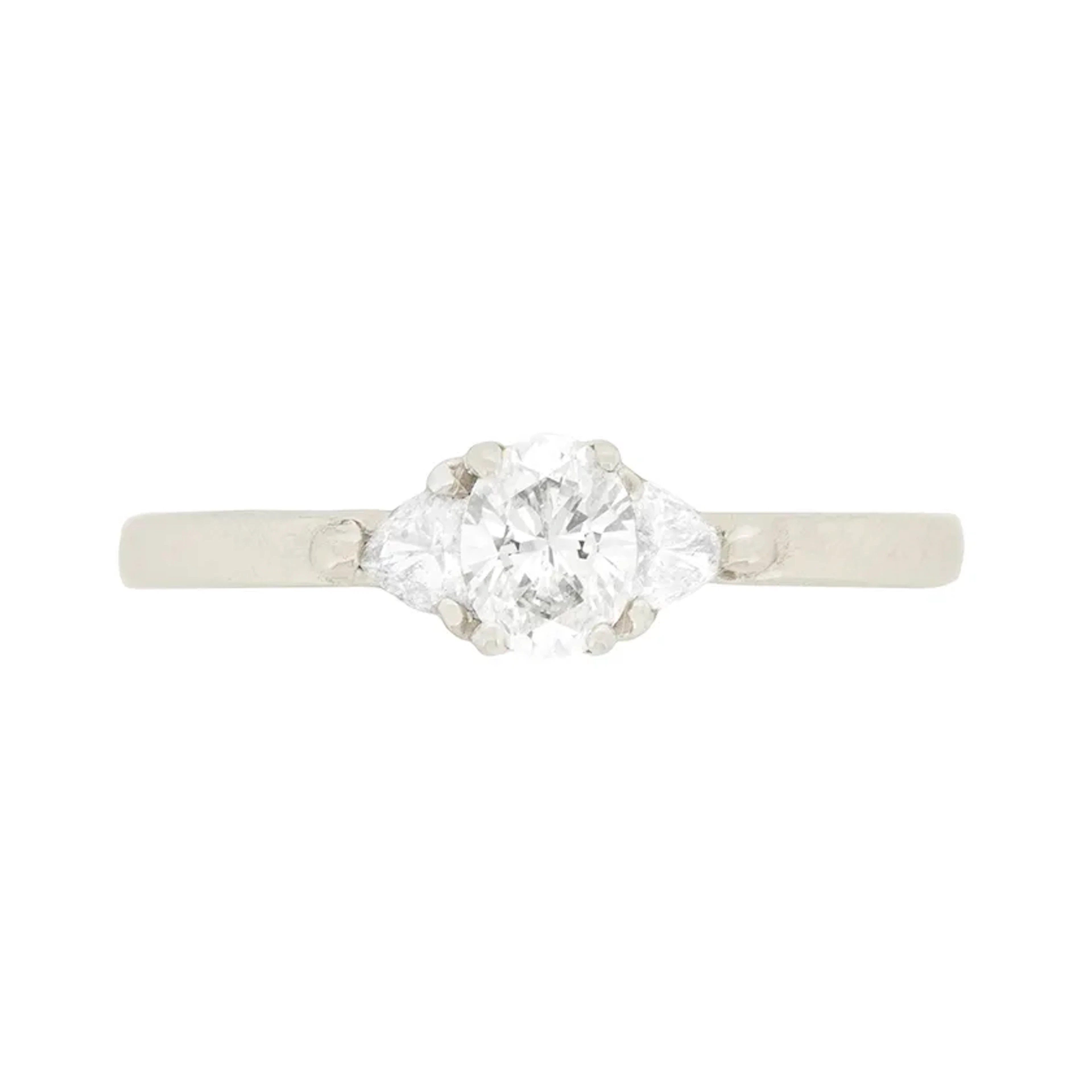 Contemporary 0.30ct Oval and Trillion Cut Diamond Solitaire Engagement Ring