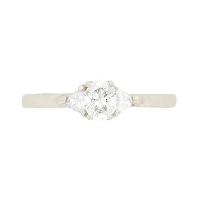 Contemporary 0.30ct Oval and Trillion Cut Diamond Solitaire Engagement Ring