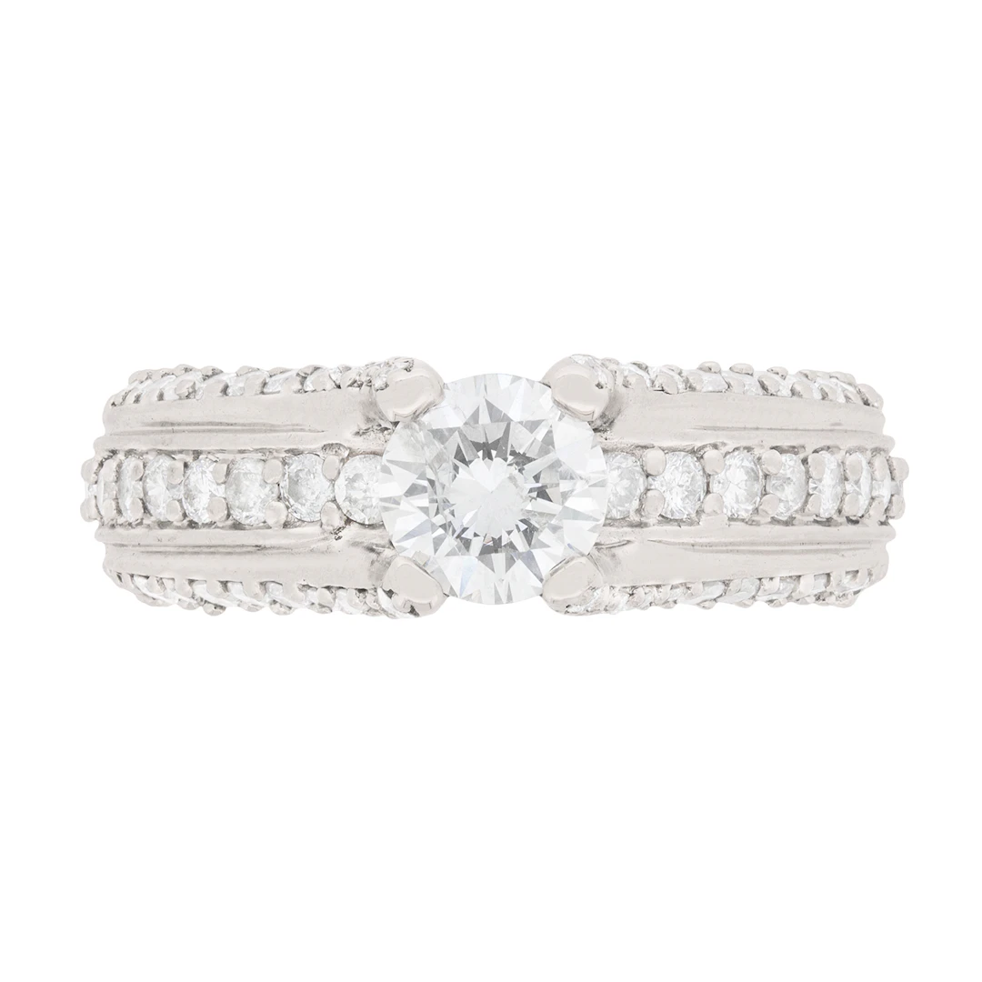 0.65 Carat Diamond Solitaire with Pave Set Diamond Shoulders