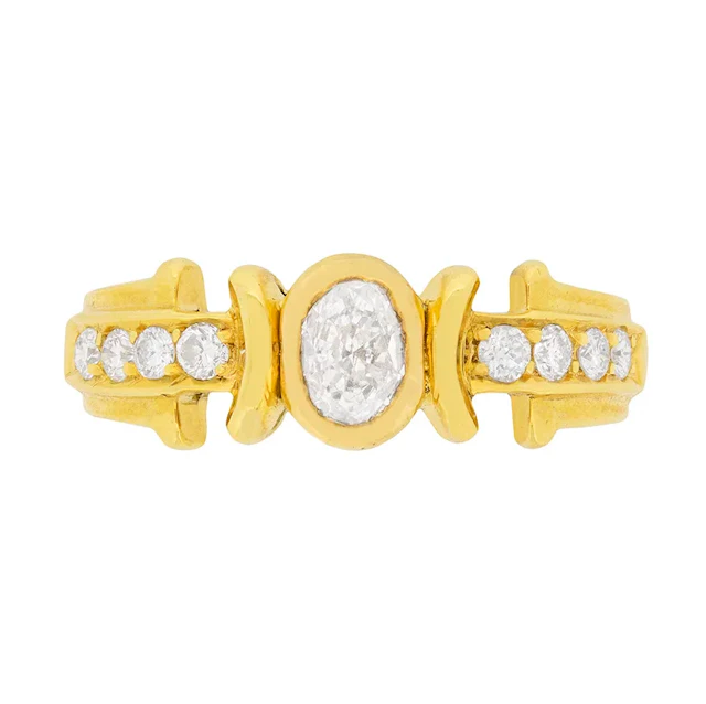 Unusual 0.44ct Oval Diamond Solitaire with Set Shoulders
